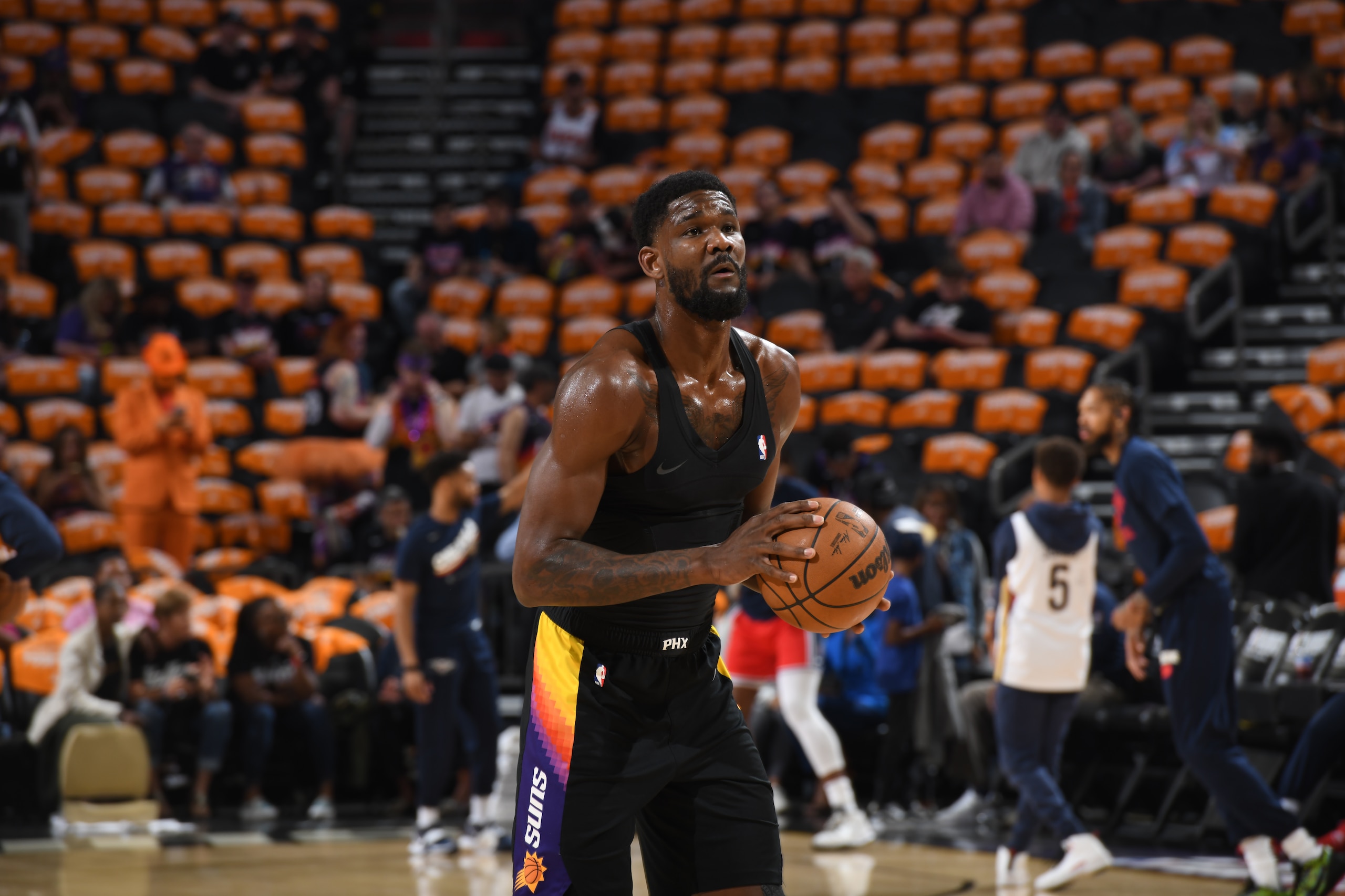 PHOENIX, AZ - APRIL 17: Deandre Ayton #22 of the Phoenix Suns warms up before Round 1 Game 1 of the 2022 NBA Playoffs against New Orleans Pelicans on April 17, 2022 at Footprint Center in Phoenix, Arizona. NOTE TO USER: User expressly acknowledges and agrees that, by downloading and or using this photograph, user is consenting to the terms and conditions of the Getty Images License Agreement. Mandatory Copyright Notice: Copyright 2022 NBAE (Photo by Kate Frese/NBAE via Getty Images)
