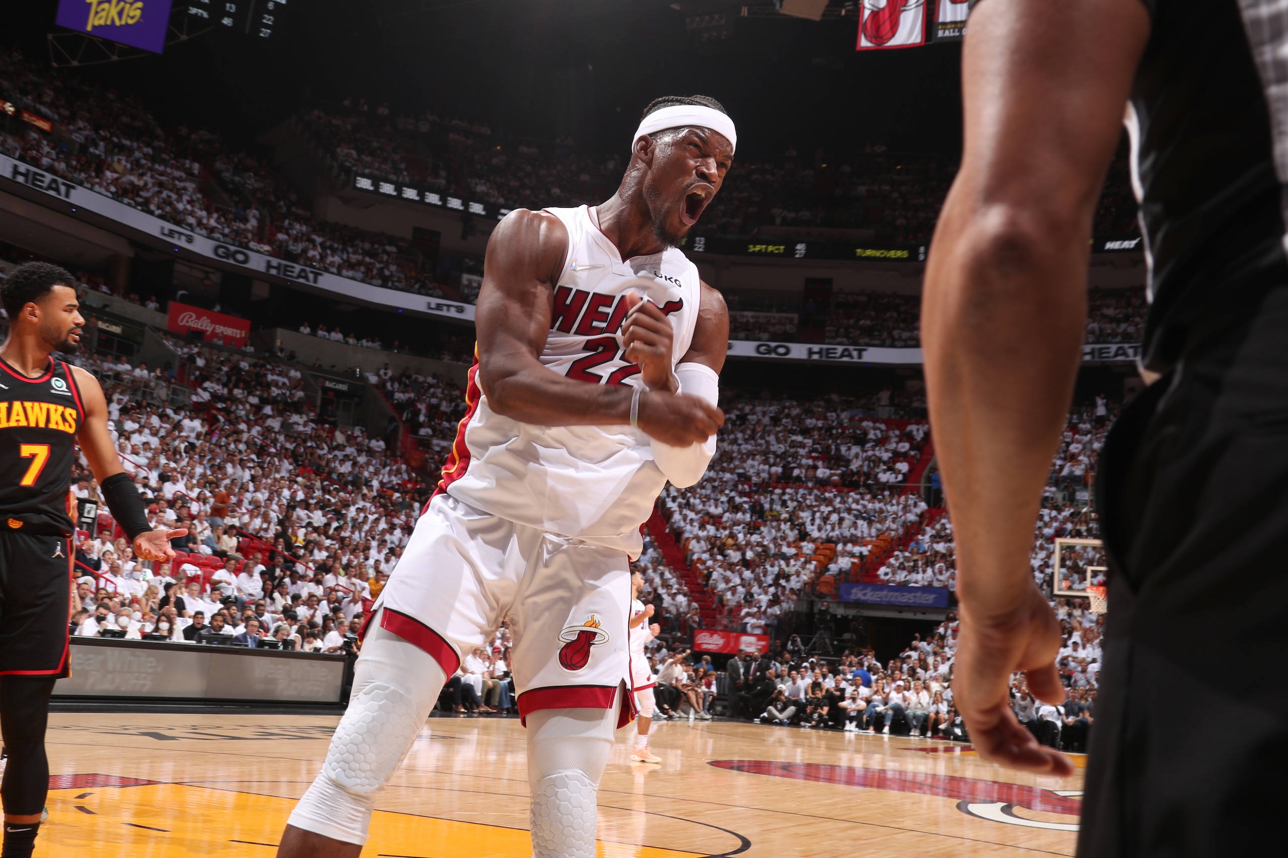 MIAMI, FL - APRIL 19: Jimmy Butler #22 of the Miami Heat reacts to a play during the game against the Atlanta Hawks during Round 1 Game 2 of the 2022 NBA Playoffs on April 19, 2022 at FTX Arena in Miami, Florida. NOTE TO USER: User expressly acknowledges and agrees that, by downloading and or using this Photograph, user is consenting to the terms and conditions of the Getty Images License Agreement. Mandatory Copyright Notice: Copyright 2022 NBAE (Photo by Issac Baldizon/NBAE via Getty Images)
