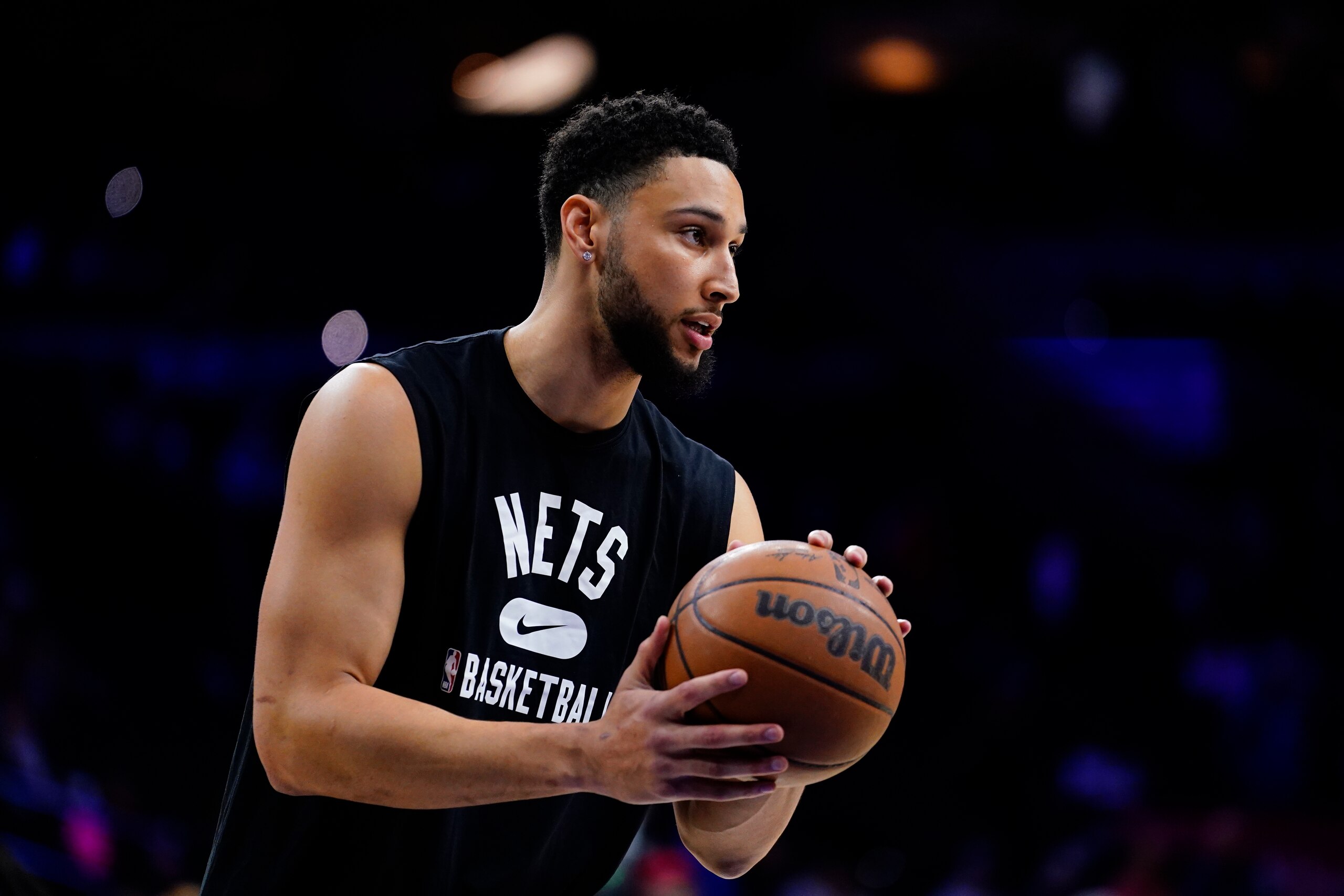 Brooklyn Nets' Ben Simmons watches practice before an NBA basketball game, Thursday, March 10, 2022, in Philadelphia. (AP Photo/Matt Slocum)