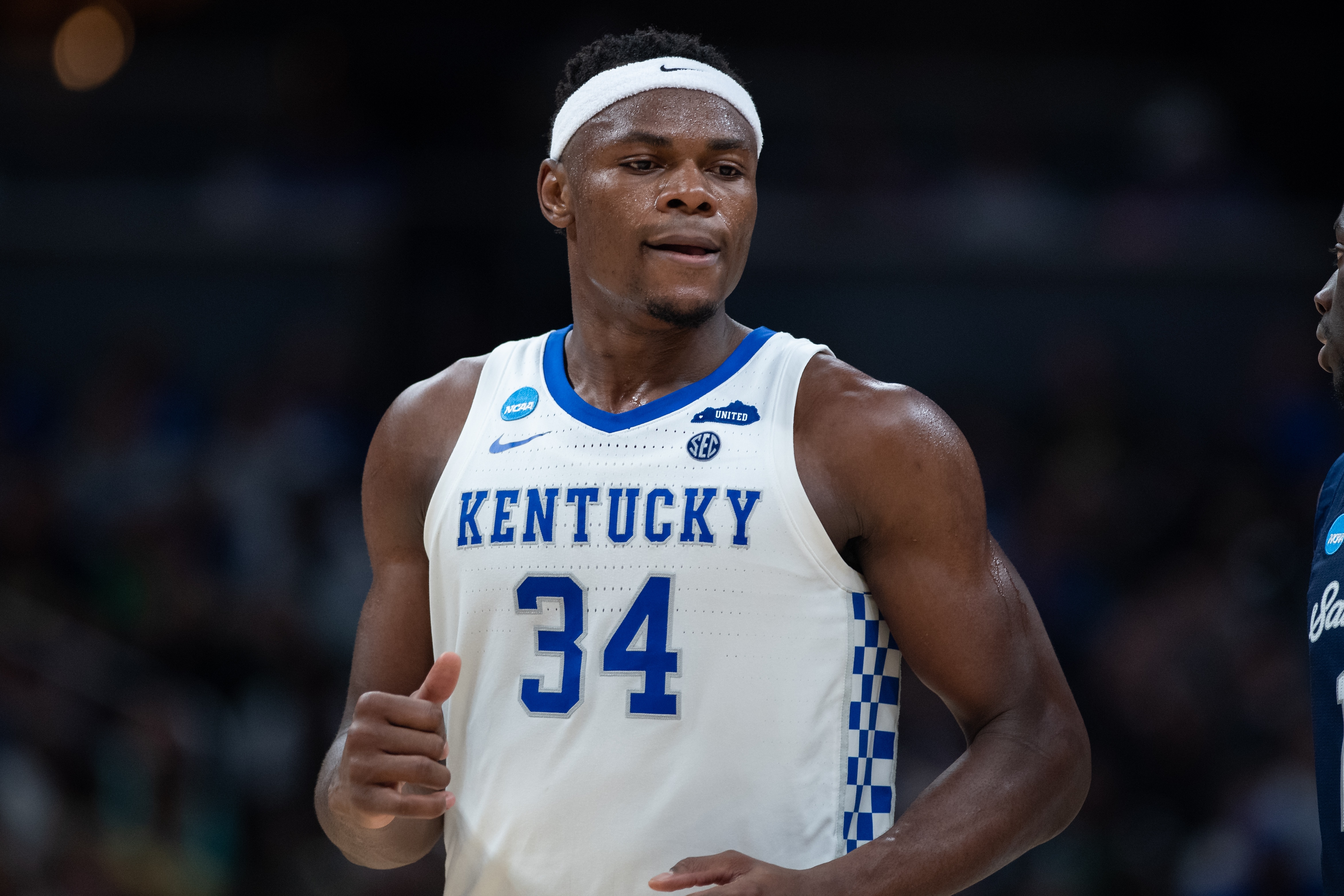 INDIANAPOLIS, IN - MARCH 17: Kentucky Wildcats forward Oscar Tshiebwe (34) looks to the sidelines during the mens March Madness college basketball game between the Kentucky Wildcats and Saint Peters Peacocks on March 17, 2022, at Gainbridge Fieldhouse in Indianapolis, IN. (Photo by Zach Bolinger/Icon Sportswire via Getty Images)