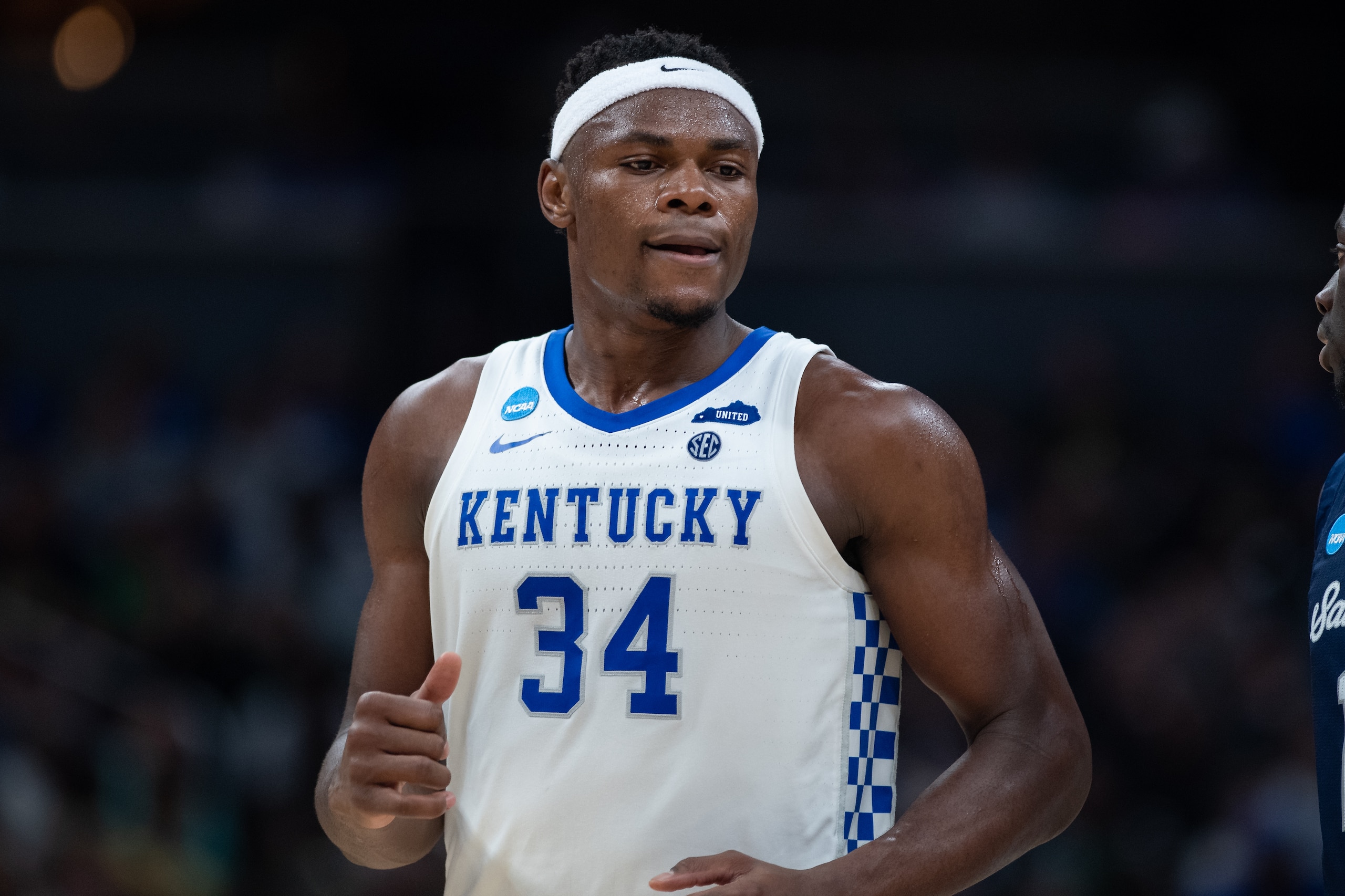 INDIANAPOLIS, IN - MARCH 17: Kentucky Wildcats forward Oscar Tshiebwe (34) looks to the sidelines during the mens March Madness college basketball game between the Kentucky Wildcats and Saint Peters Peacocks on March 17, 2022, at Gainbridge Fieldhouse in Indianapolis, IN. (Photo by Zach Bolinger/Icon Sportswire via Getty Images)