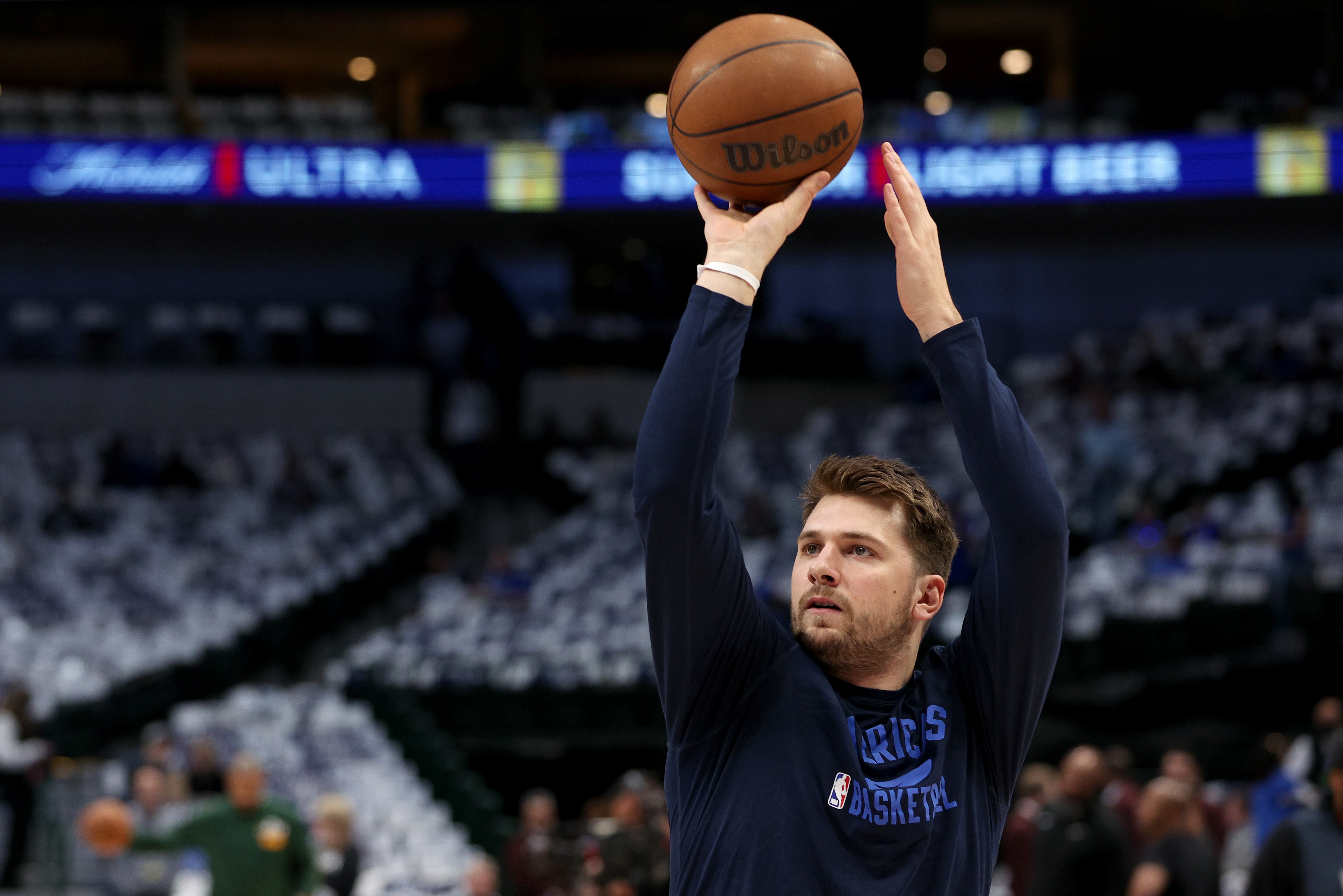 DALLAS, TEXAS - APRIL 18: Luka Doncic #77 of the Dallas Mavericks shoots the ball while working out prior to Game Two of the Western Conference First Round NBA Playoffs at American Airlines Center on April 18, 2022 in Dallas, Texas. NOTE TO USER: User expressly acknowledges and agrees that, by downloading and or using this photograph, User is consenting to the terms and conditions of the Getty Images License Agreement. (Photo by Tom Pennington/Getty Images)