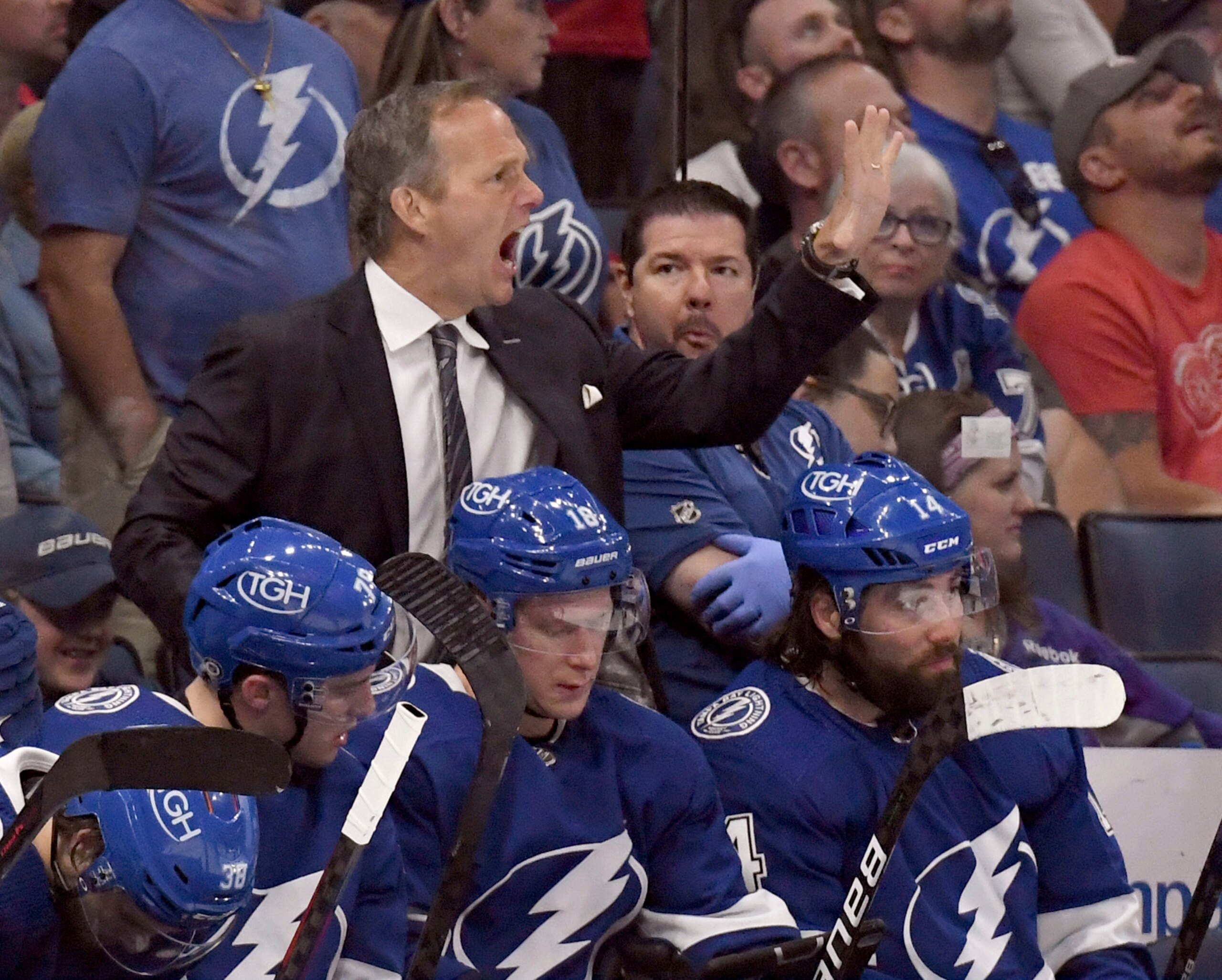 Tampa Bay Lightning head coach Jon Cooper instructs his team during the third period an NHL hockey game against the Detroit Red Wings Tuesday, April 19, 2022, in Tampa, Fla. (AP Photo/Jason Behnken)