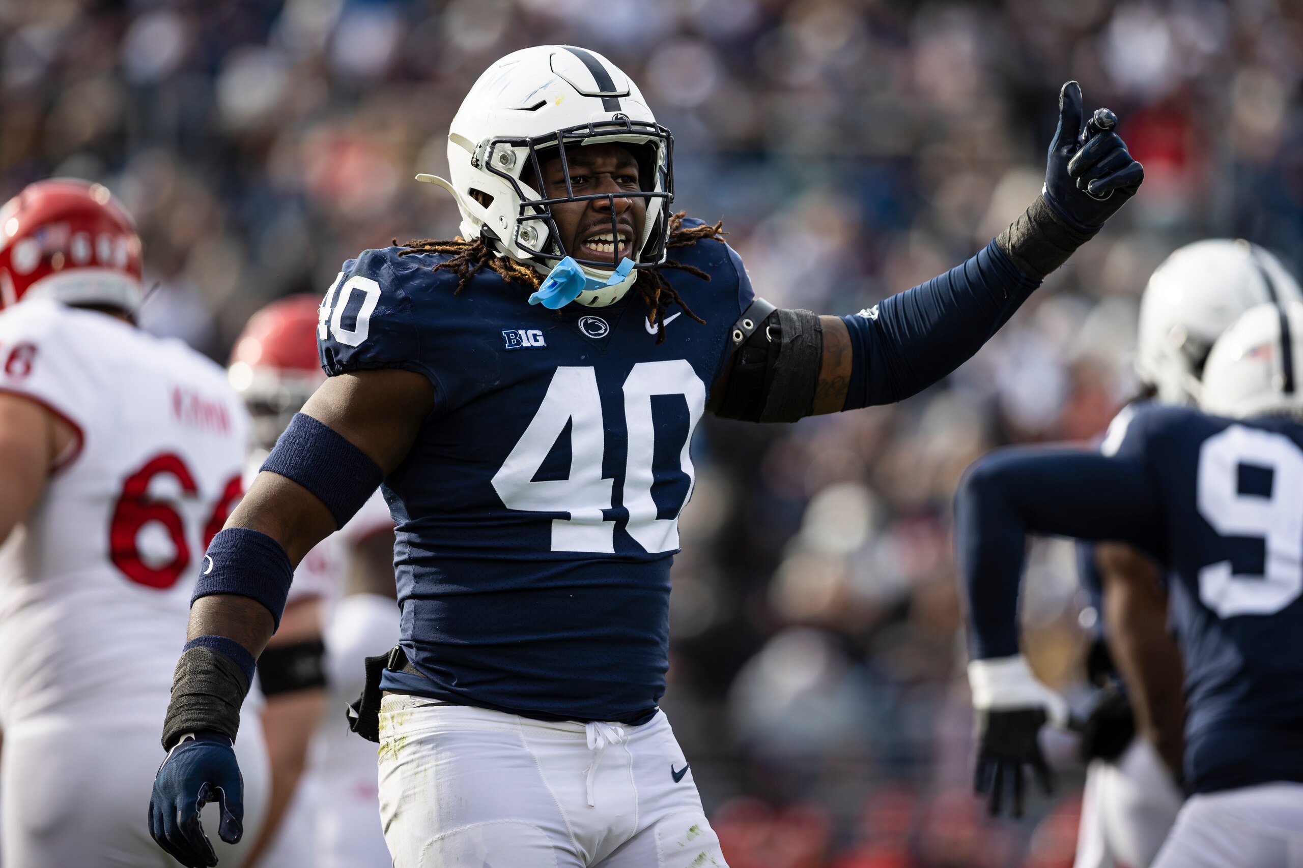 STATE COLLEGE, PA - NOVEMBER 20: Jesse Luketa #40 of the Penn State Nittany Lions celebrates after a play against the Rutgers Scarlet Knights during the first half at Beaver Stadium on November 20, 2021 in State College, Pennsylvania. (Photo by Scott Taetsch/Getty Images)