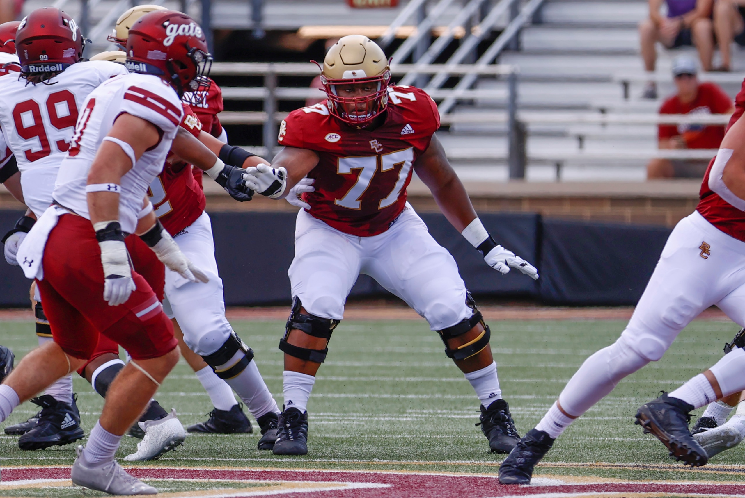 CHESTNUT HILL, MA - SEPTEMBER 04: Boston College Eagles offensive lineman Zion Johnson (77) blocks during a game between the Boston College Eagles and the Colgate University Raiders on September 4, 2021, at Alumni Stadium in Chestnut Hill, Massachusetts. (Photo by Fred Kfoury III/Icon Sportswire via Getty Images)
