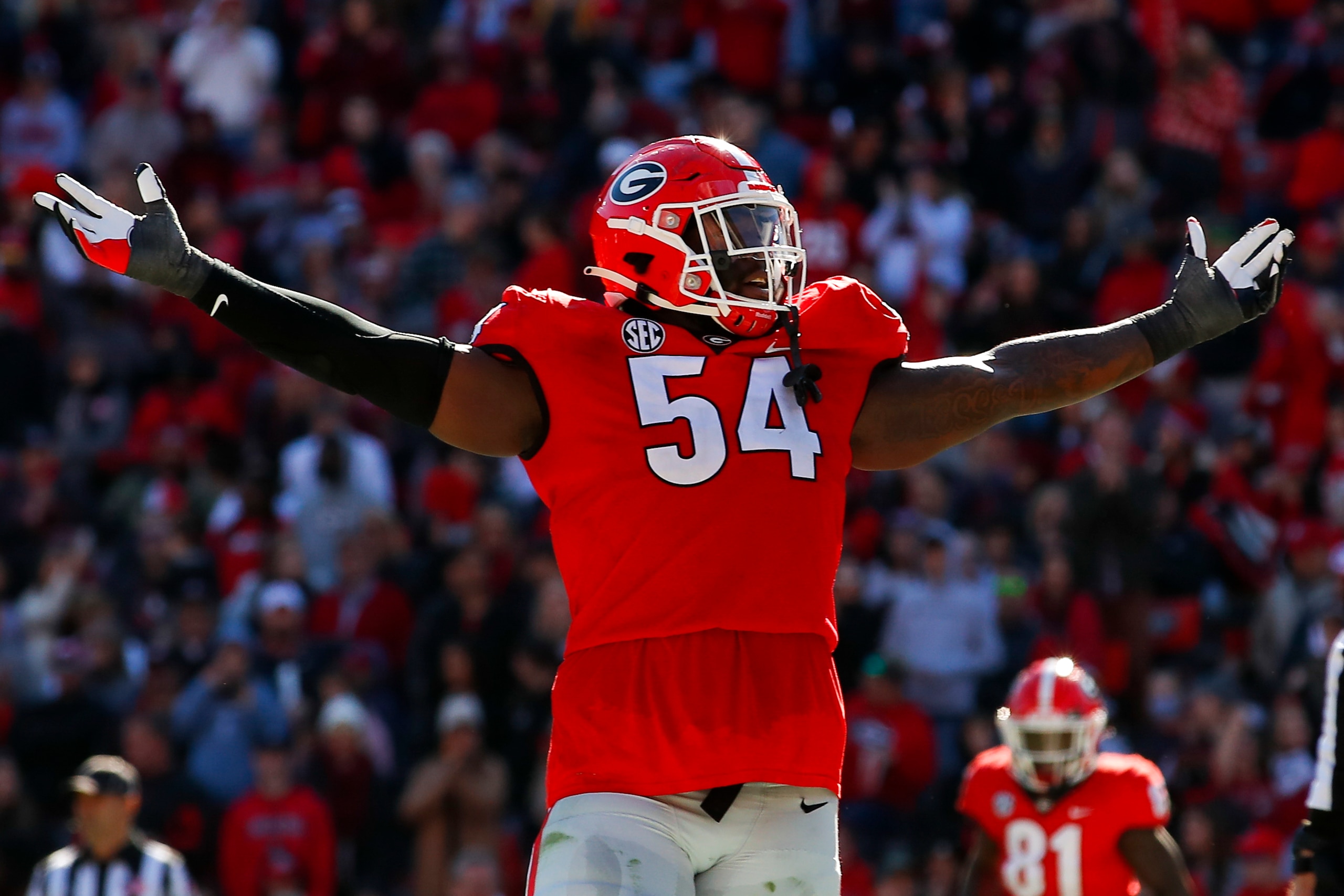 ATHENS, GA - NOVEMBER 20: Justin Shaffer #54 of the Georgia Bulldogs reacts after a touchdown is scored during the first half against the Charleston Southern Buccaneers at Sanford Stadium on November 20, 2021 in Athens, Georgia. (Photo by Todd Kirkland/Getty Images)
