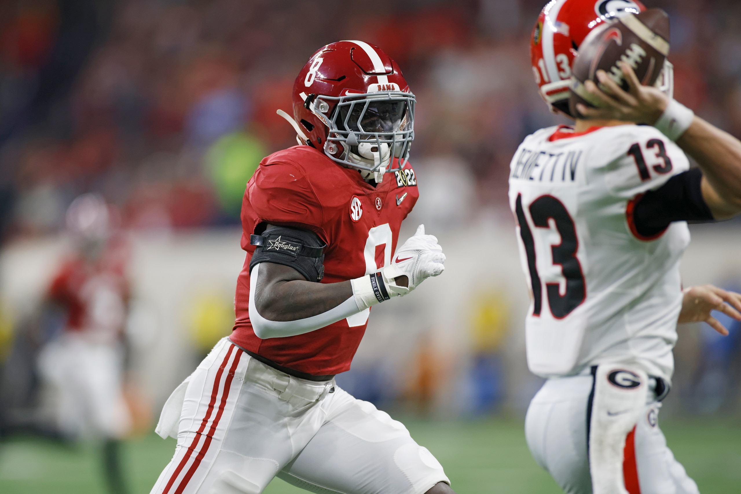 INDIANAPOLIS, IN - JANUARY 10: Alabama Crimson Tide linebacker Christian Harris (8) rushes on defense during the CFP National Championship college football game against the Georgia Bulldogs on Jan. 10, 2022 at Lucas Oil Stadium in Indianapolis, Indiana. (Photo by Joe Robbins/Icon Sportswire via Getty Images)