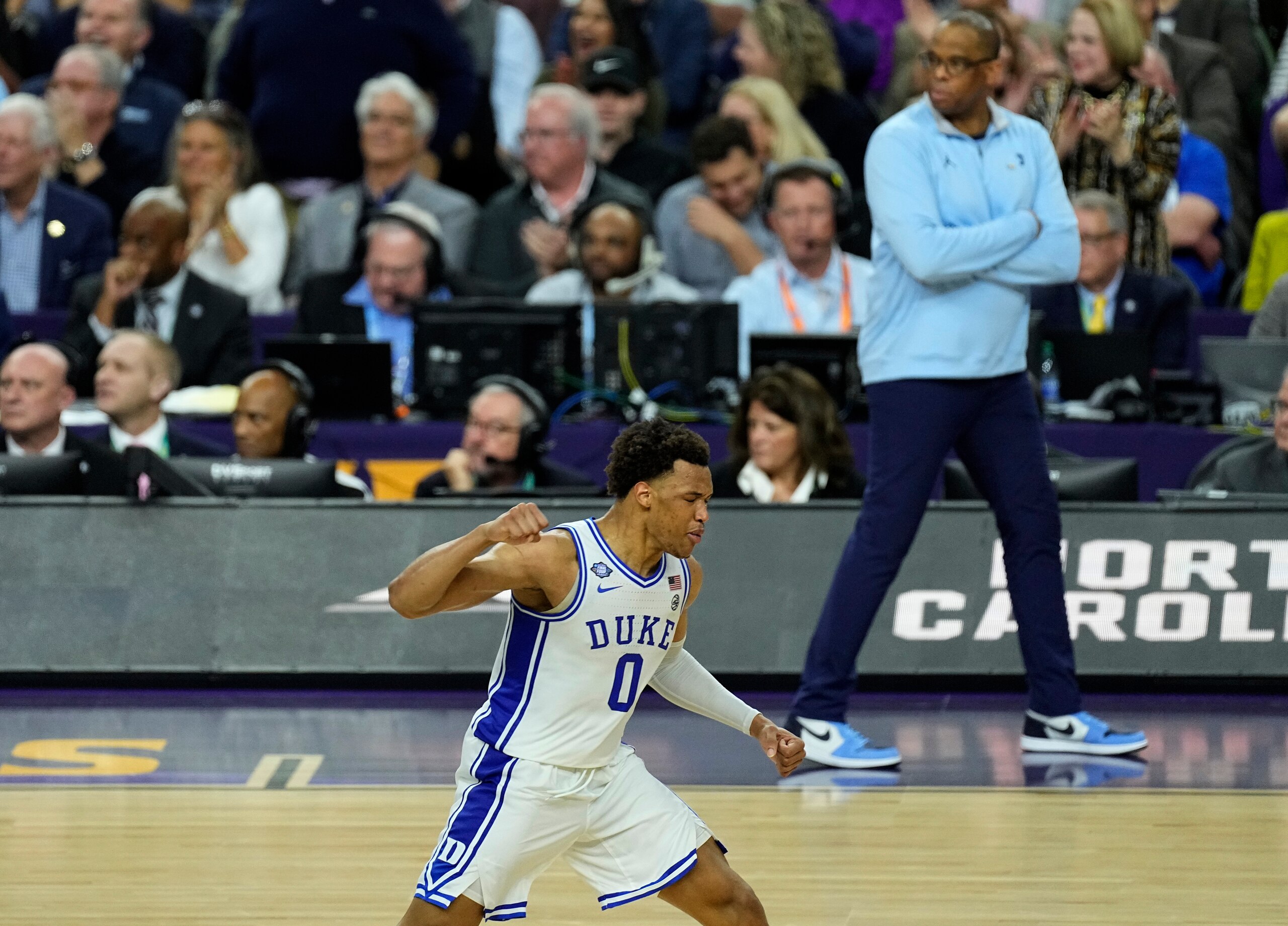 Duke forward Wendell Moore Jr. (0) reacts to his three-point shot against North Carolina during the second half of a college basketball game in the semifinal round of the Men's Final Four NCAA tournament, Saturday, April 2, 2022, in New Orleans. (AP Photo/Gerald Herbert)