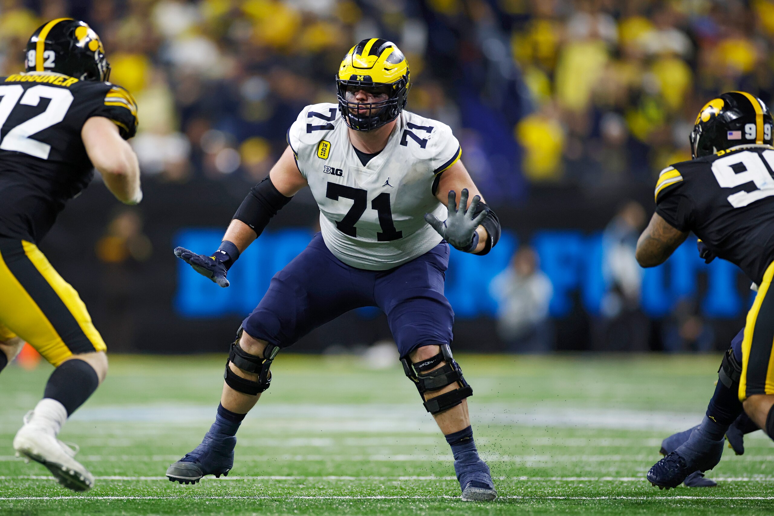 INDIANAPOLIS, IN - DECEMBER 04: Michigan Wolverines offensive lineman Andrew Stueber (71) blocks during the Big Ten Championship college football game against the Iowa Hawkeyes on Dec. 4, 2021 at Lucas Oil Stadium in Indianapolis, Indiana. (Photo by Joe Robbins/Icon Sportswire via Getty Images) INDIANAPOLIS, IN - DECEMBER 04: Michigan Wolverines offensive lineman Andrew Stueber (71) blocks during the Big Ten Championship college football game against the Iowa Hawkeyes on Dec. 4, 2021 at Lucas Oil Stadium in Indianapolis, Indiana. (Photo by Joe Robbins/Icon Sportswire via Getty Images)