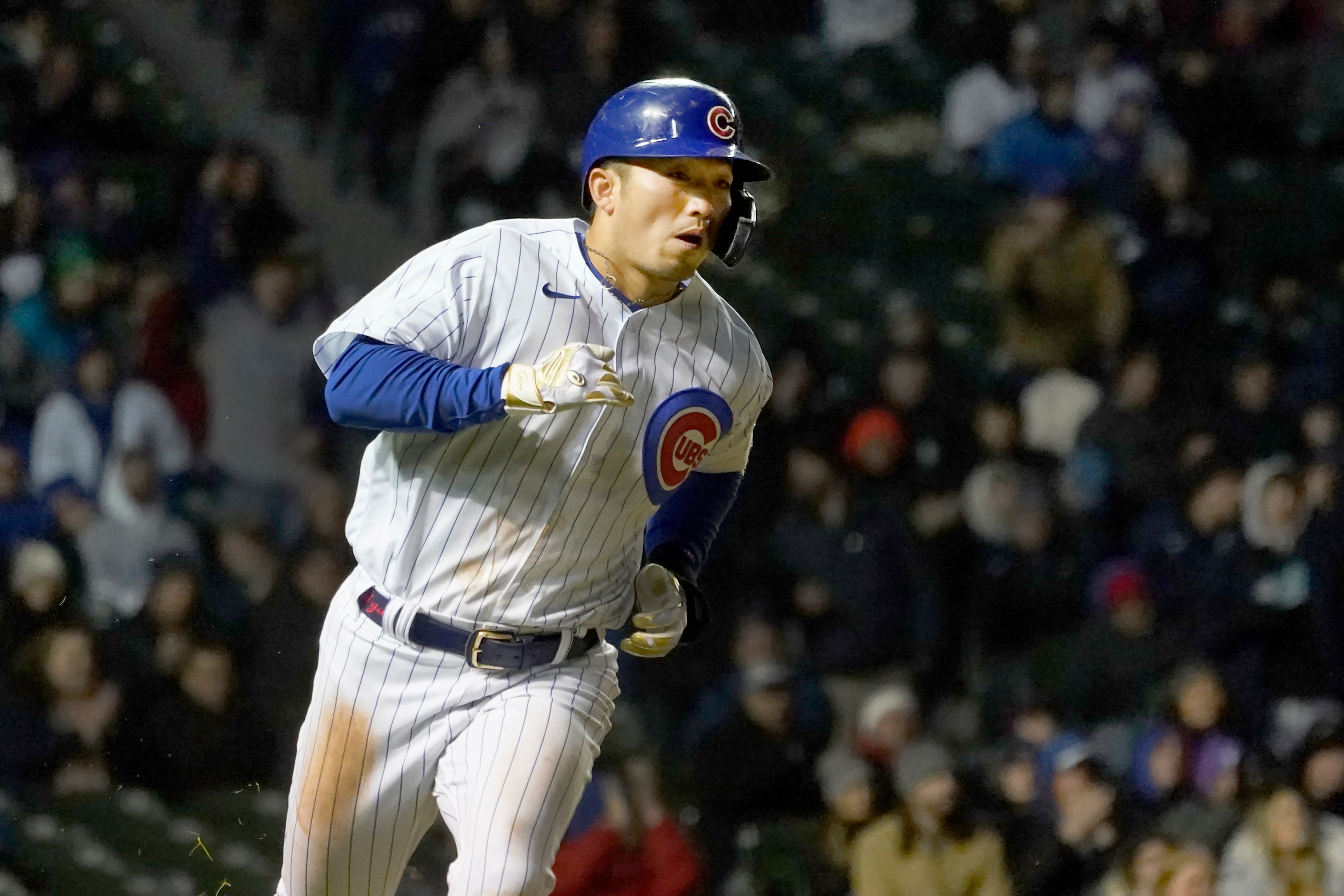 Chicago Cubs' Seiya Suzuki heads to first during a baseball game against the Tampa Bay Rays Monday, April 18, 2022, in Chicago. (AP Photo/Charles Rex Arbogast)