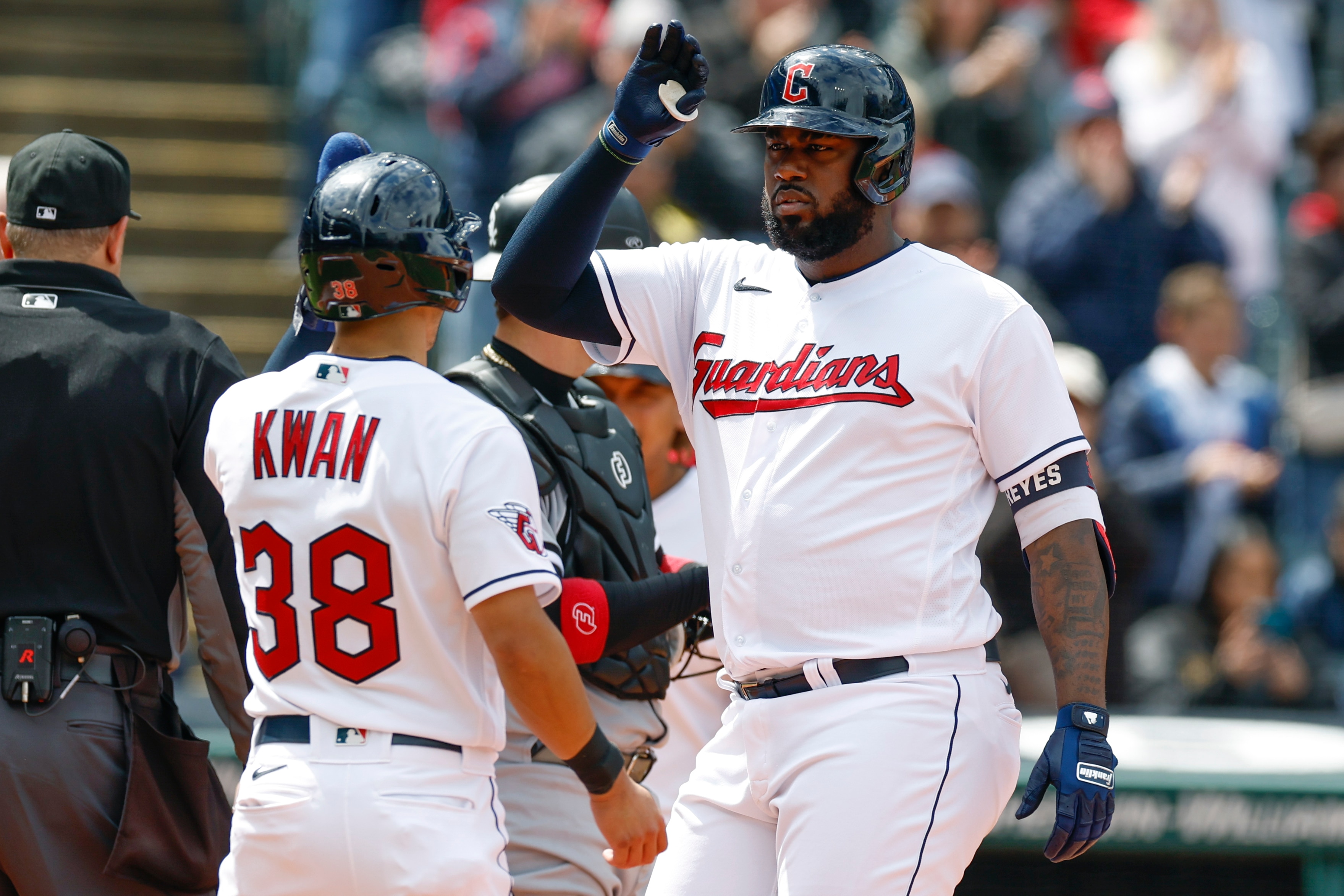 Cleveland Guardians' Franmil Reyes celebrates with Steven Kwan (38) after hitting a two run home run against the Chicago White Sox during the third inning of a baseball game, Thursday, April 21, 2022, in Cleveland. (AP Photo/Ron Schwane)