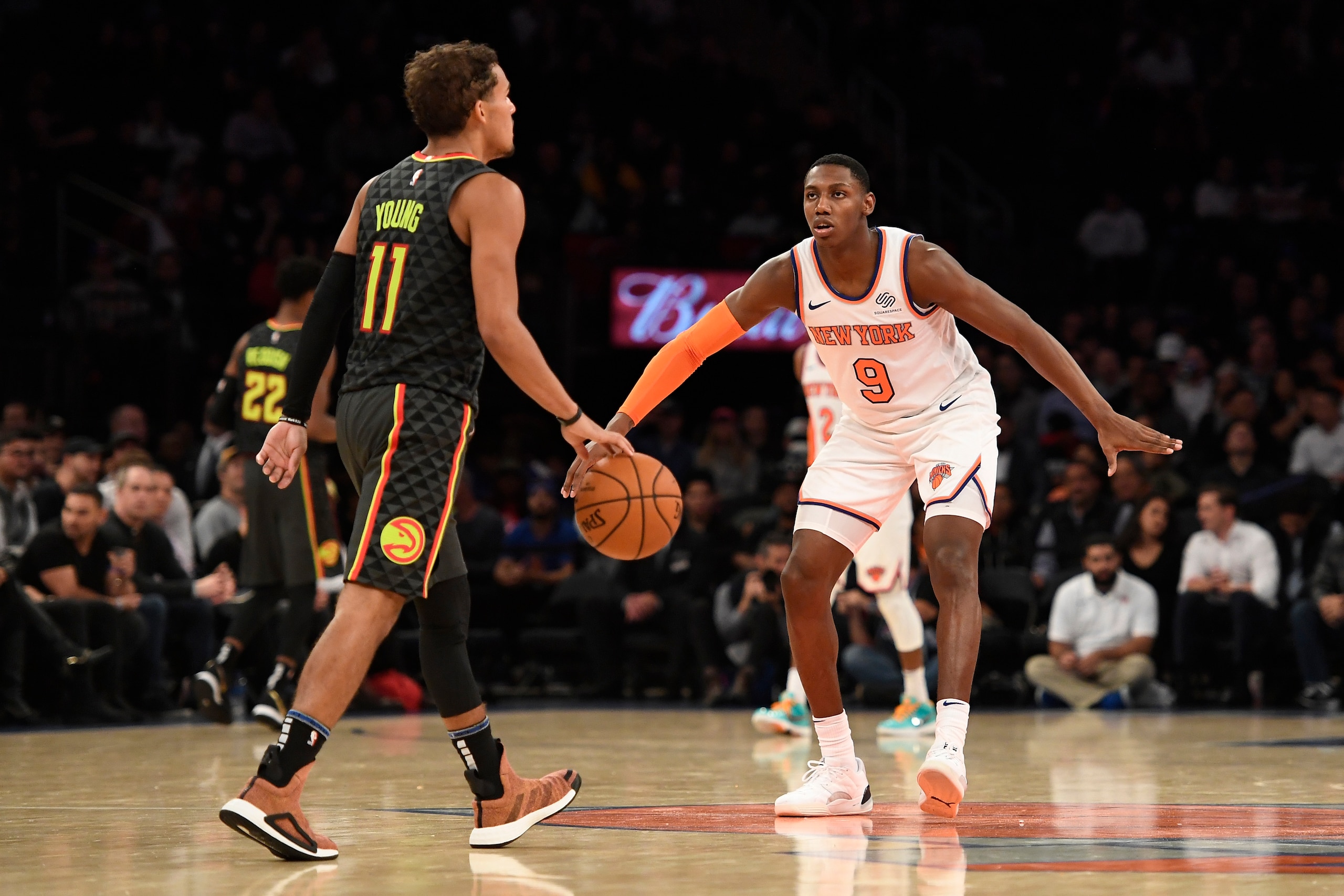 NEW YORK, NEW YORK - OCTOBER 16: RJ Barrett #9 of the New York Knicks guards Trae Young #11 of the Atlanta Hawks during the third quarter of the preseason game at Madison Square Garden on October 16, 2019 in New York City. NOTE TO USER: User expressly acknowledges and agrees that, by downloading and or using this Photograph, user is consenting to the terms and conditions of the Getty Images License Agreement. (Photo by Sarah Stier/Getty Images) NEW YORK, NEW YORK - OCTOBER 16: RJ Barrett #9 of the New York Knicks guards Trae Young #11 of the Atlanta Hawks during the third quarter of the preseason game at Madison Square Garden on October 16, 2019 in New York City. NOTE TO USER: User expressly acknowledges and agrees that, by downloading and or using this Photograph, user is consenting to the terms and conditions of the Getty Images License Agreement. (Photo by Sarah Stier/Getty Images)