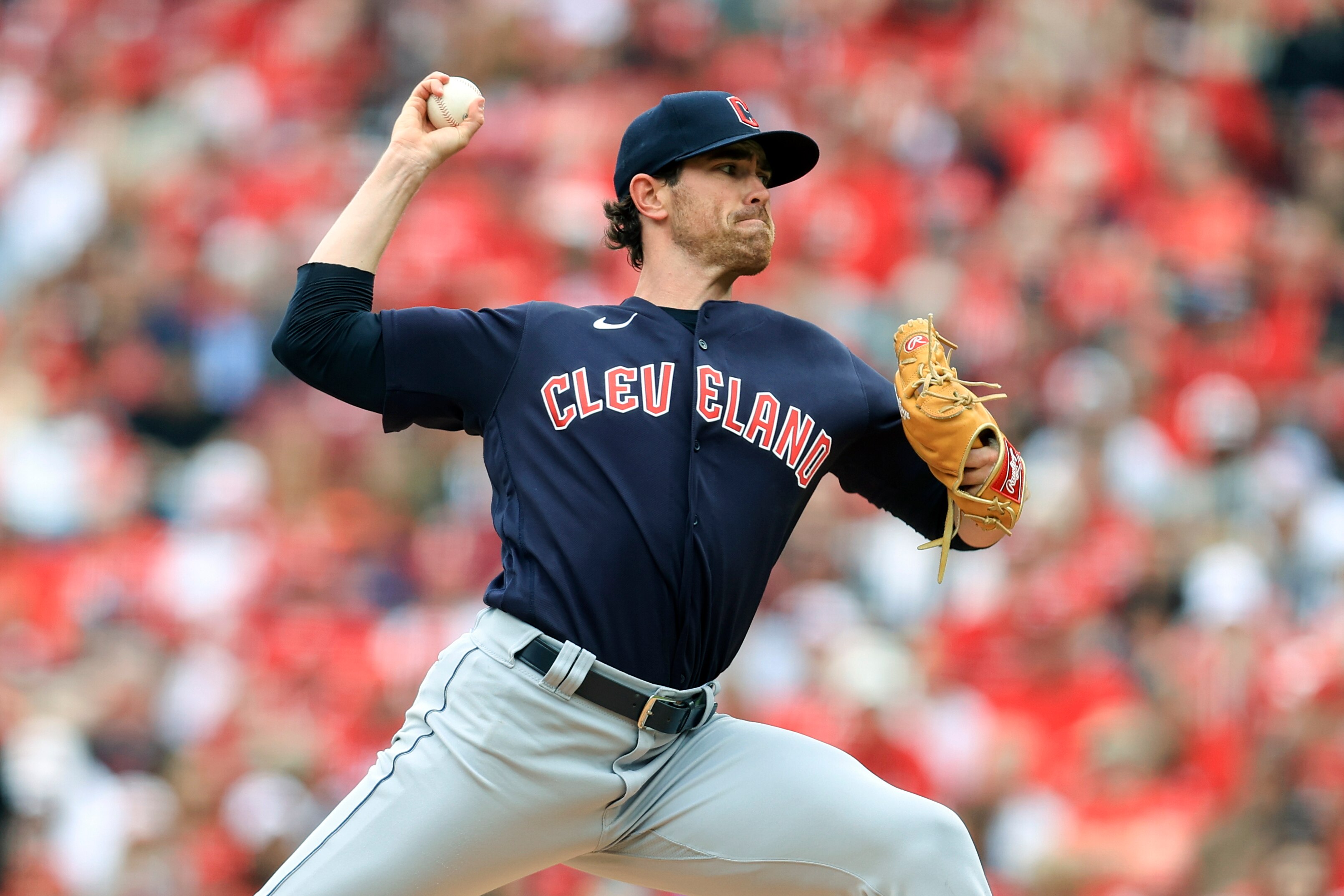 Cleveland Guardians' Shane Bieber throws during the first inning of a baseball game against the Cincinnati Reds in Cincinnati, Tuesday, April 12, 2022. (AP Photo/Aaron Doster)