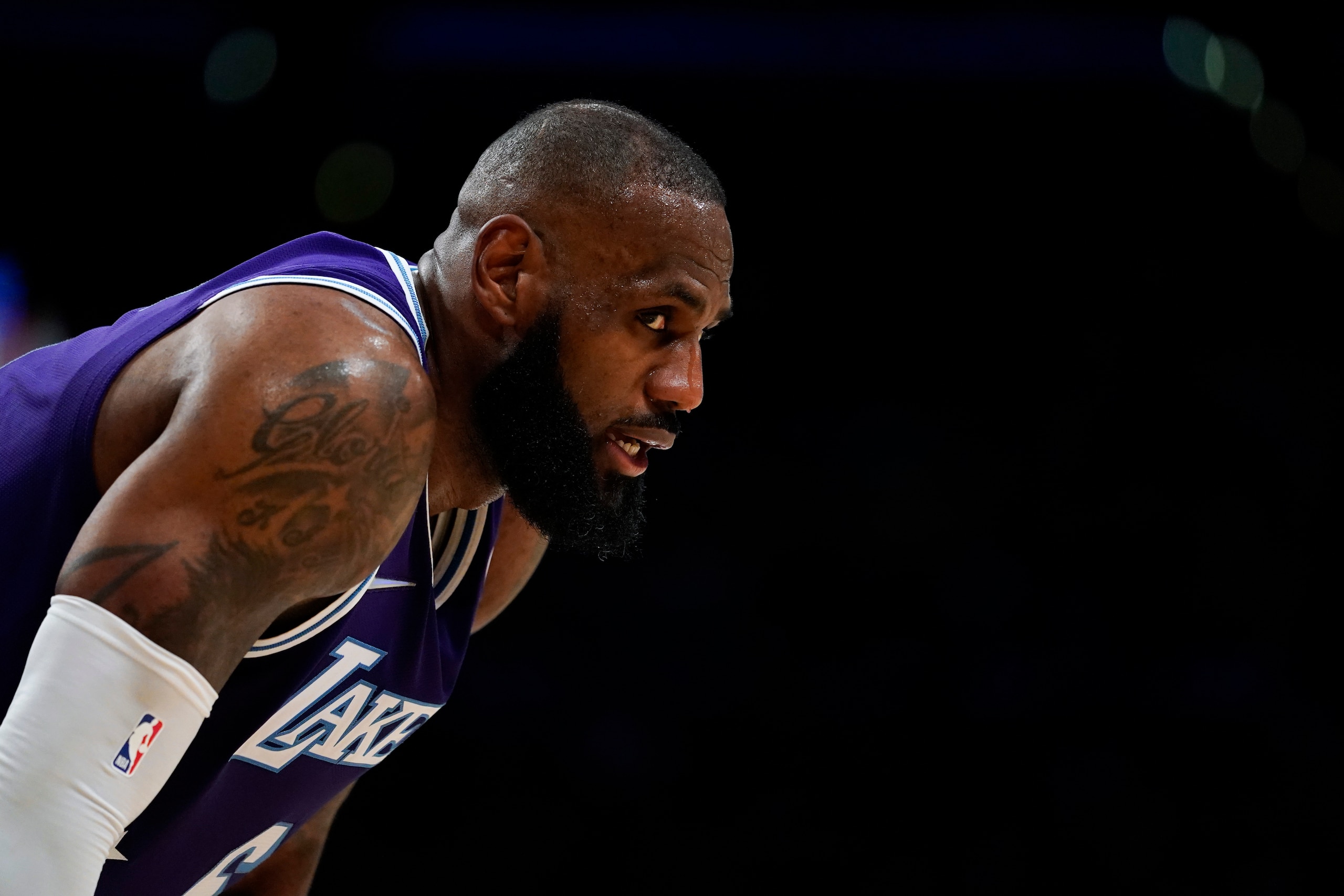 Los Angeles Lakers forward LeBron James (6) stands on the court during an NBA basketball game against the New Orleans Pelicans in Los Angeles, Friday, April 1, 2022. (AP Photo/Ashley Landis)