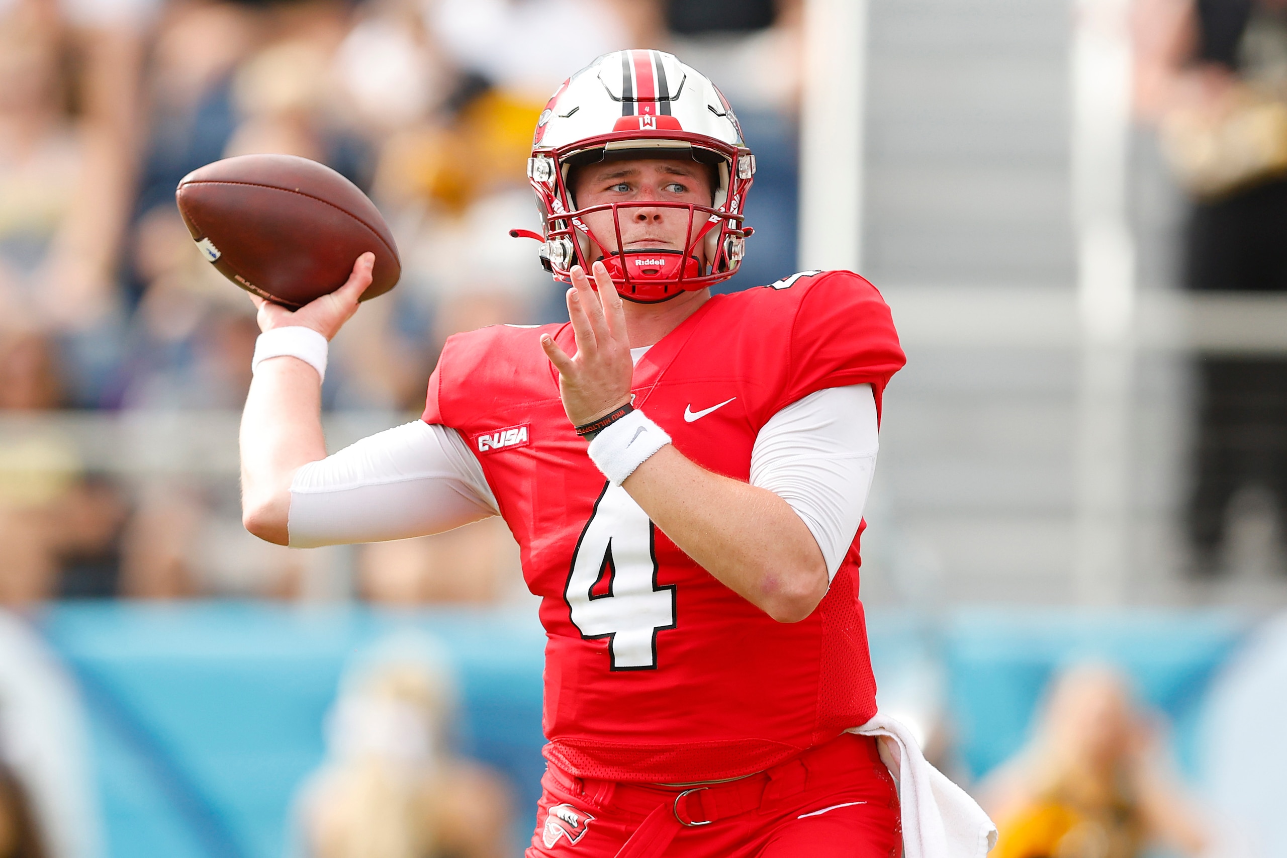 BOCA RATON, FLORIDA - DECEMBER 18: Bailey Zappe #4 of the Western Kentucky Hilltoppers in action against the Appalachian State Mountaineers during the first half of the RoofClaim.com Boca Raton Bowl at FAU Stadium on December 18, 2021 in Boca Raton, Florida. (Photo by Michael Reaves/Getty Images)