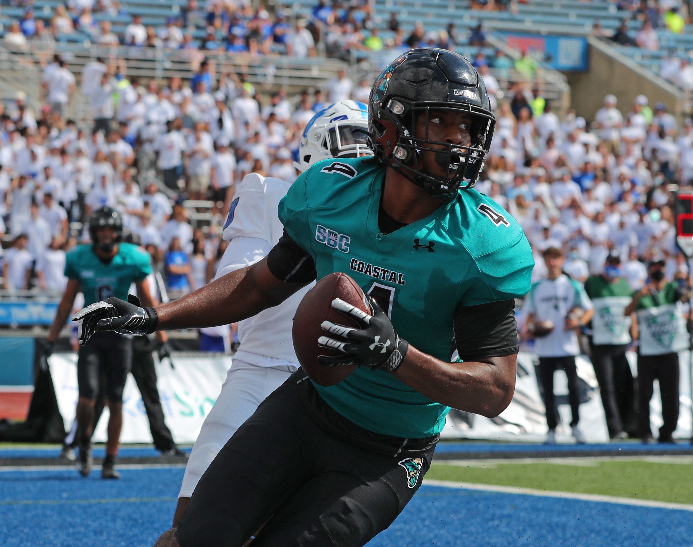 BUFFALO, NY - SEPTEMBER 18: Isaiah Likely #4 of the Coastal Carolina Chanticleers scores a touchdown against the Buffalo Bulls at UB Stadium on September 18, 2021 in Buffalo, New York. (Photo by Timothy T Ludwig/Getty Images)