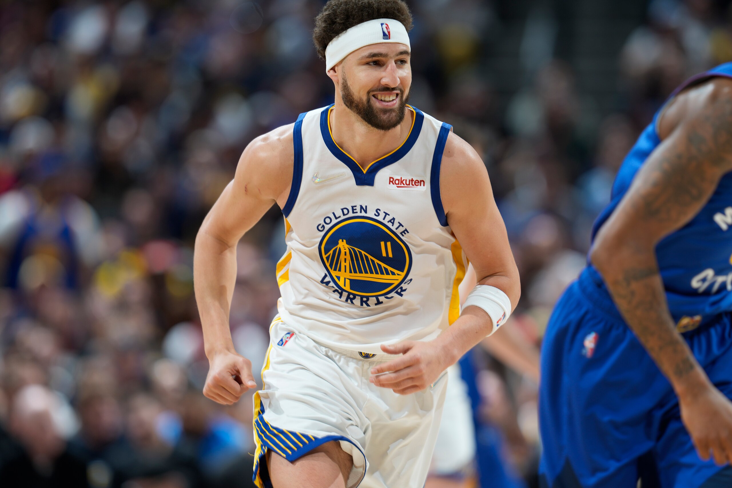 Golden State Warriors guard Klay Thompson (11) in the second half of Game 3 of an NBA basketball first-round Western Conference playoff series Thursday, April 21, 2022, in Denver. (AP Photo/David Zalubowski)