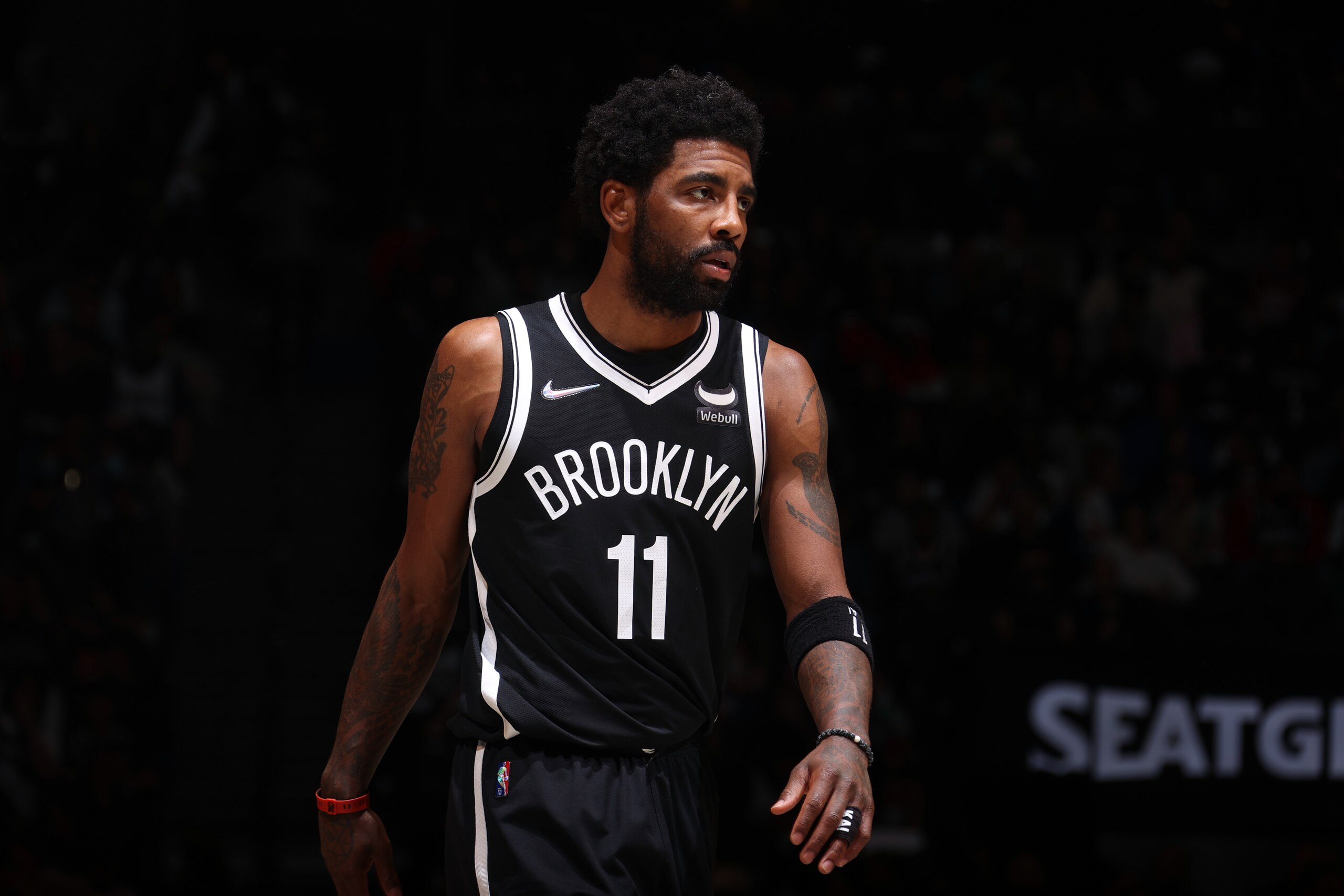 BROOKLYN, NY - APRIL 23: Kyrie Irving #11 of the Brooklyn Nets looks on against the Boston Celtics during Round 1 Game 3 of the 2022 NBA Playoffs on April 23, 2022 at Barclays Center in Brooklyn, New York. NOTE TO USER: User expressly acknowledges and agrees that, by downloading and or using this Photograph, user is consenting to the terms and conditions of the Getty Images License Agreement. Mandatory Copyright Notice: Copyright 2022 NBAE (Photo by Nathaniel S. Butler/NBAE via Getty Images)