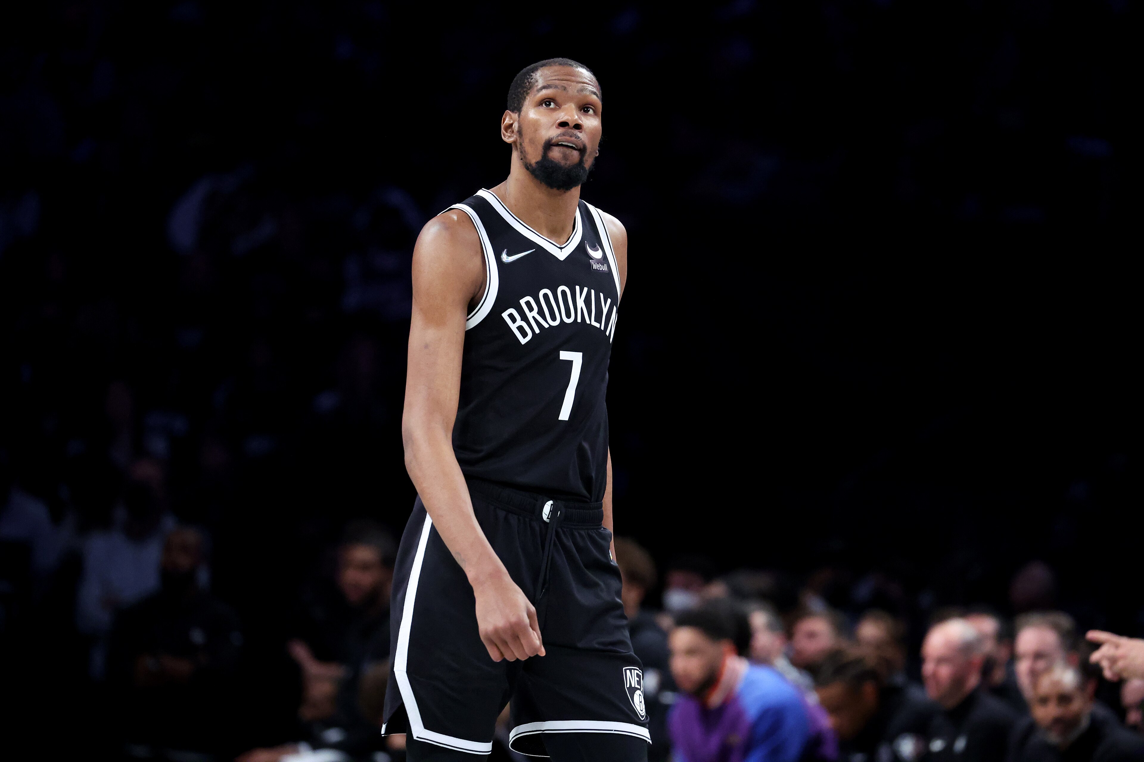 NEW YORK, NEW YORK - APRIL 23: Kevin Durant #7 of the Brooklyn Nets looks on against the Boston Celtics during Game Three of the Eastern Conference First Round NBA Playoffs at Barclays Center on April 23, 2022 in New York City. NOTE TO USER: User expressly acknowledges and agrees that, by downloading and or using this photograph, User is consenting to the terms and conditions of the Getty Images License Agreement. (Photo by Al Bello/Getty Images). NEW YORK, NEW YORK - APRIL 23: Kevin Durant #7 of the Brooklyn Nets looks on against the Boston Celtics during Game Three of the Eastern Conference First Round NBA Playoffs at Barclays Center on April 23, 2022 in New York City. NOTE TO USER: User expressly acknowledges and agrees that, by downloading and or using this photograph, User is consenting to the terms and conditions of the Getty Images License Agreement. (Photo by Al Bello/Getty Images).