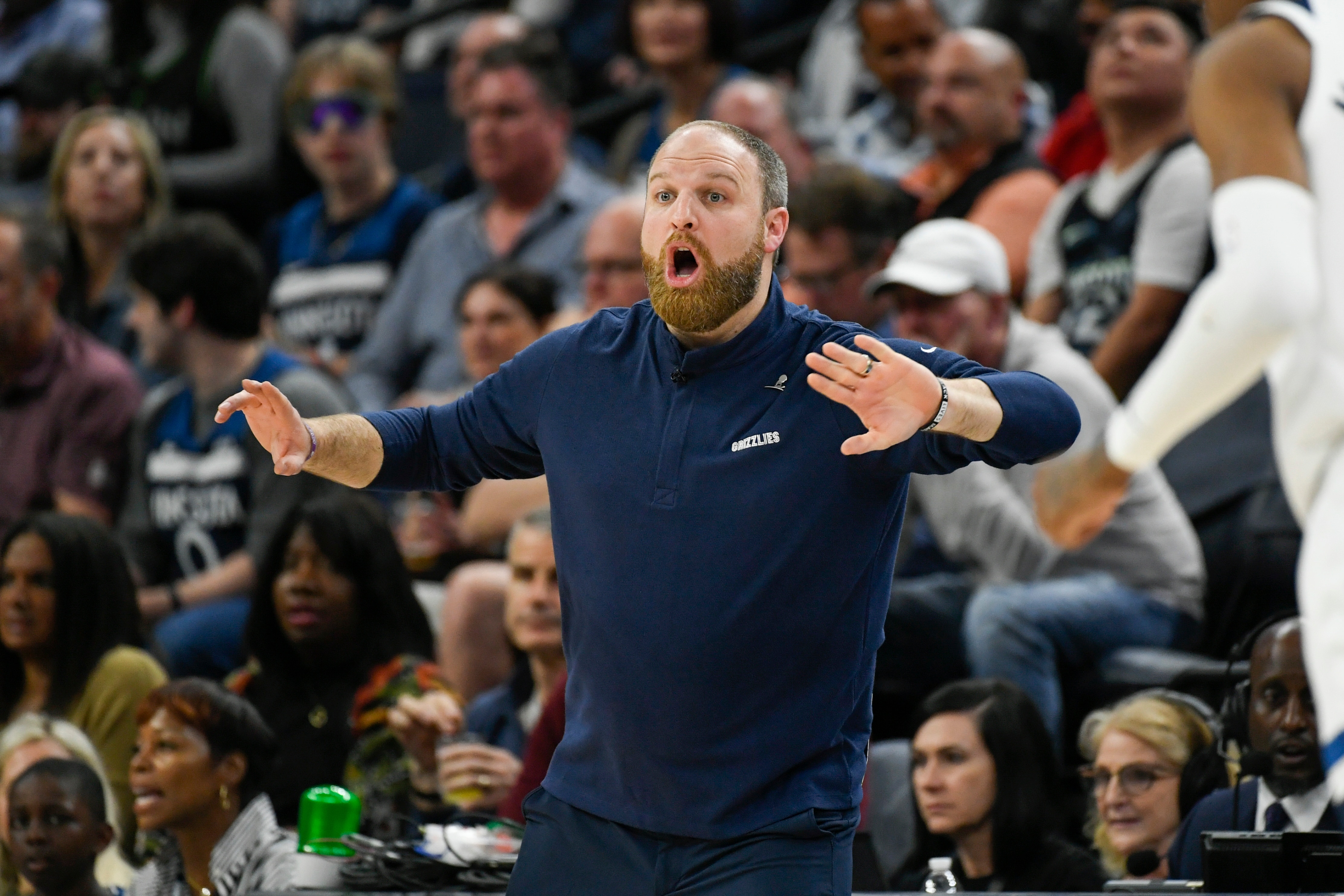 Memphis Grizzlies head coach Taylor Jenkins shouts from the sidelines during their game against the Minnesota Timberwolves in second half in Game 4 of an NBA basketball first-round playoff series Saturday, April 23, 2022, in Minneapolis. The Timberwolves won 119-118. (AP Photo/Craig Lassig)