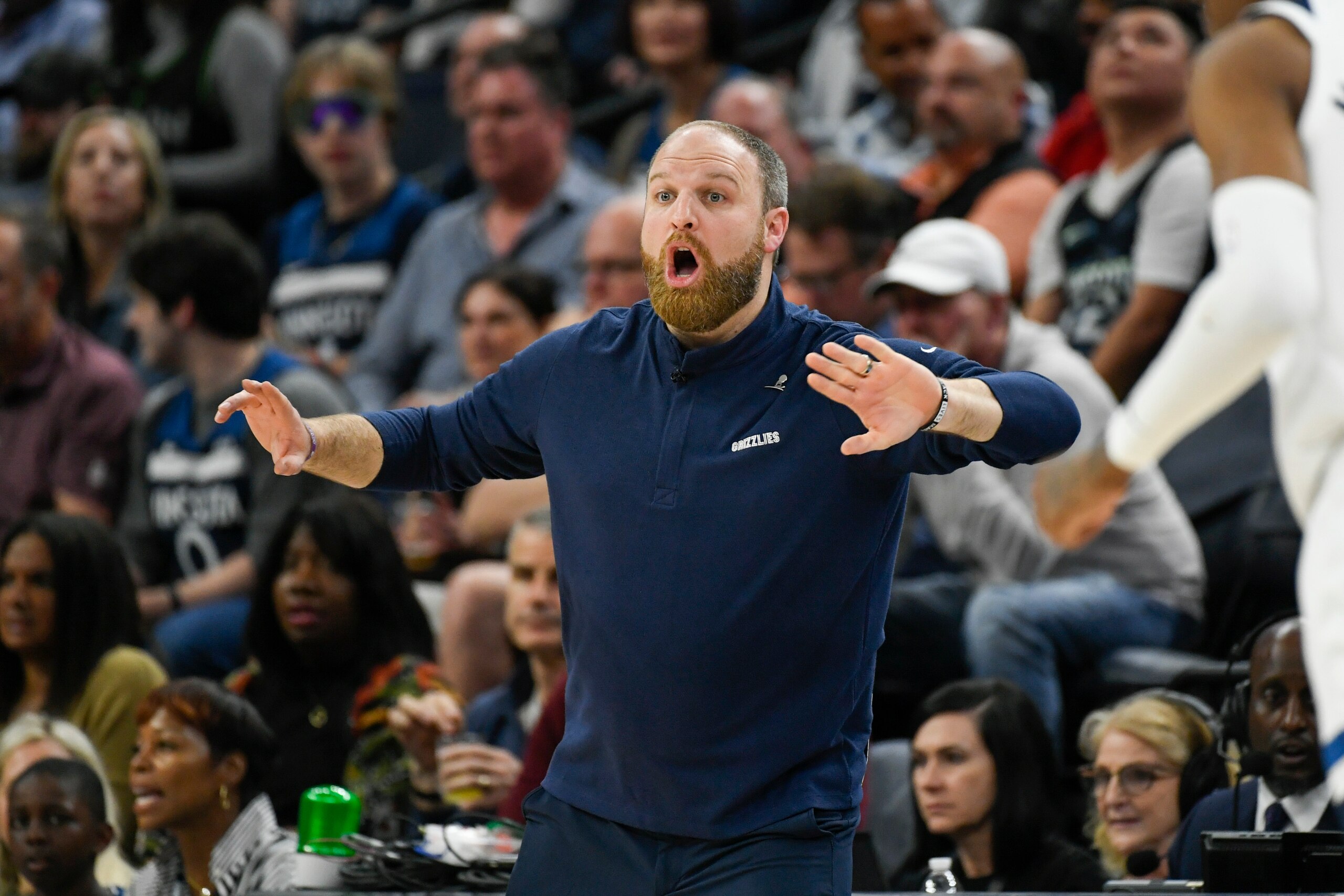 Memphis Grizzlies head coach Taylor Jenkins shouts from the sidelines during their game against the Minnesota Timberwolves in second half in Game 4 of an NBA basketball first-round playoff series Saturday, April 23, 2022, in Minneapolis. The Timberwolves won 119-118. (AP Photo/Craig Lassig)