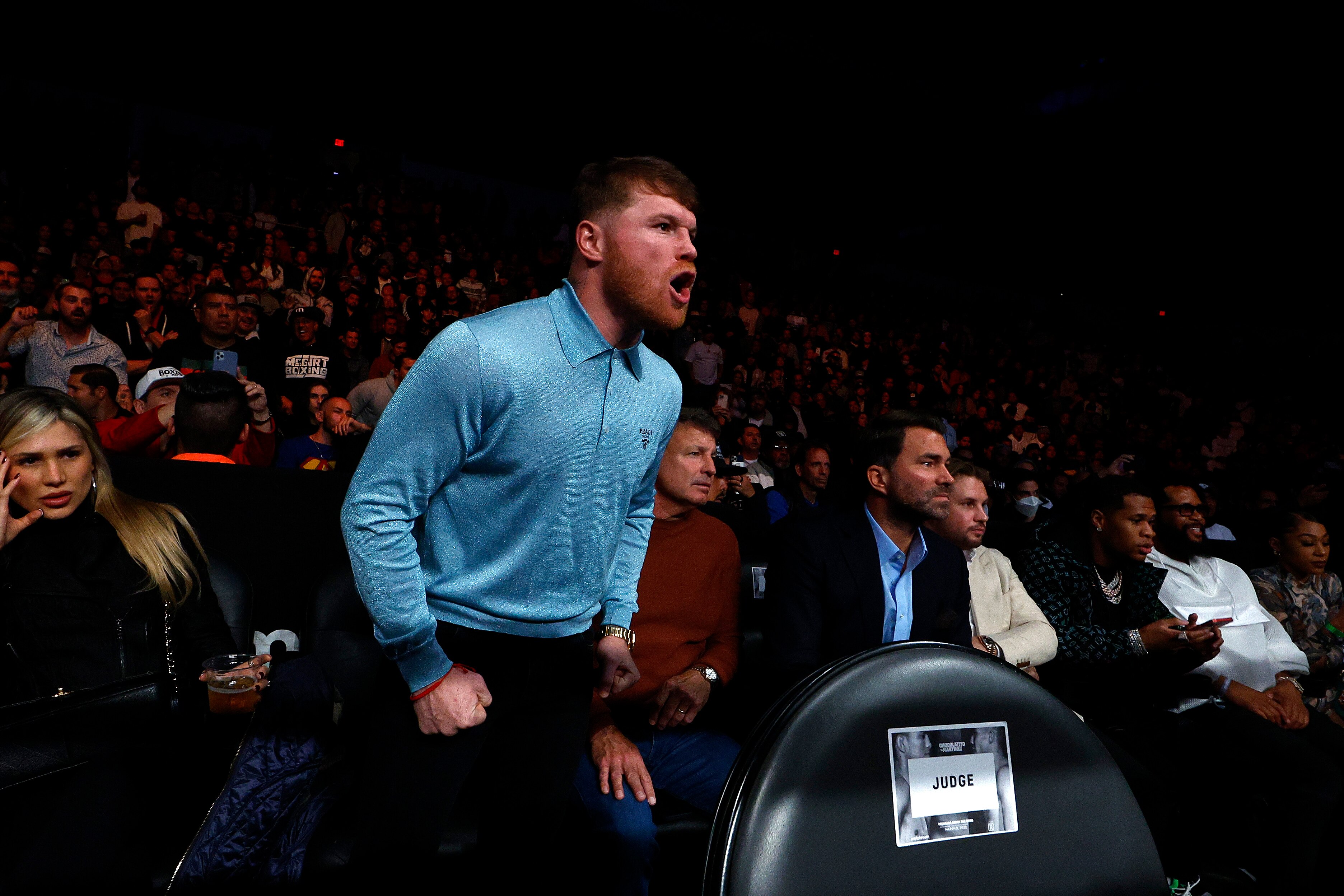 SAN DIEGO, CALIFORNIA - MARCH 05:   Canelo Alvarez attends the super flyweight division fight between Roman "Chocolatito" Gonzalez and Julio Cesar Martinez at Pechanga Arena on March 05, 2022 in San Diego, California. (Photo by Ronald Martinez/Getty Images)