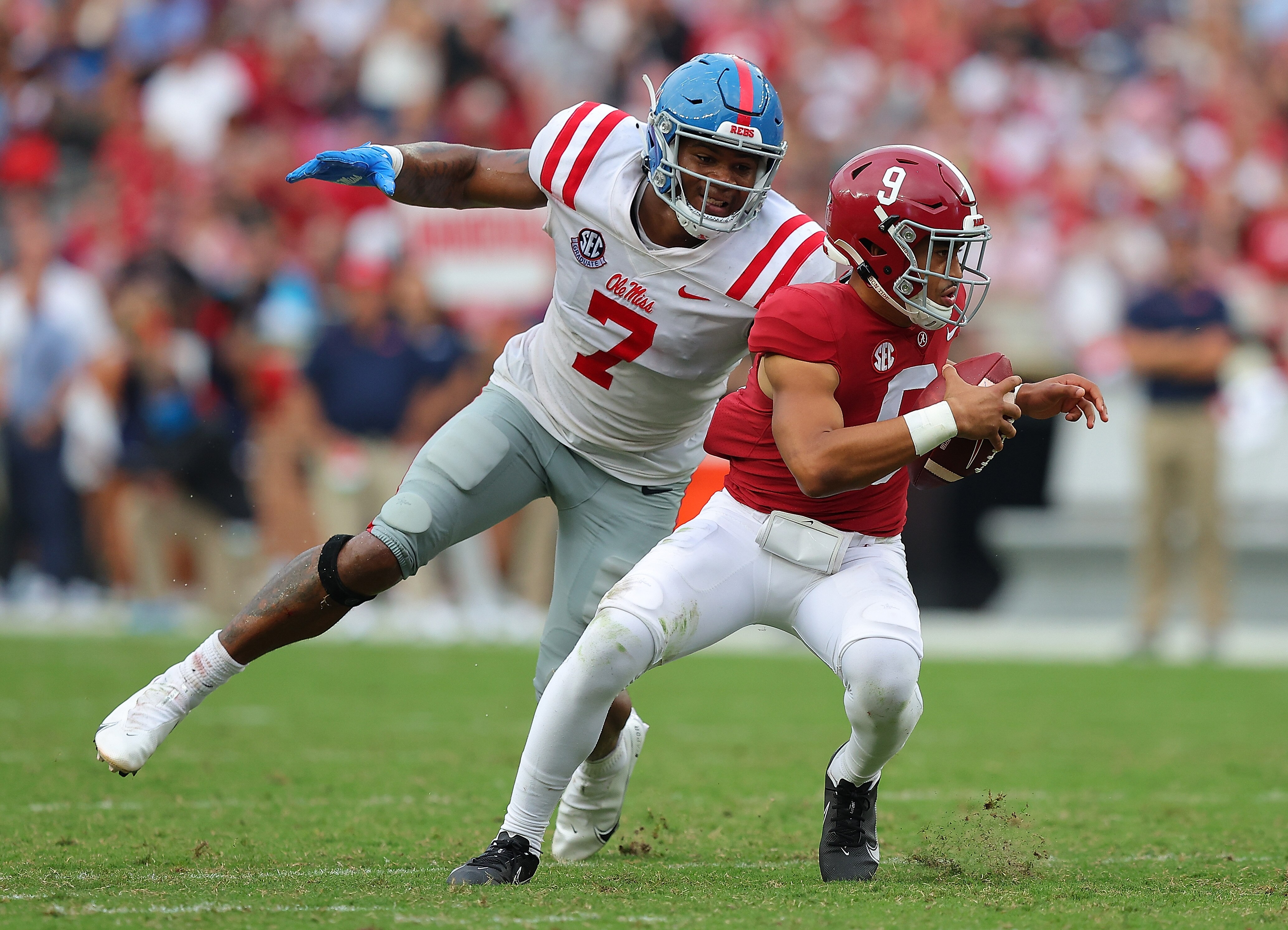 TUSCALOOSA, ALABAMA - OCTOBER 02:  Sam Williams #7 of the Mississippi Rebels sacks Bryce Young #9 of the Alabama Crimson Tide during the second half at Bryant-Denny Stadium on October 02, 2021 in Tuscaloosa, Alabama. (Photo by Kevin C. Cox/Getty Images)