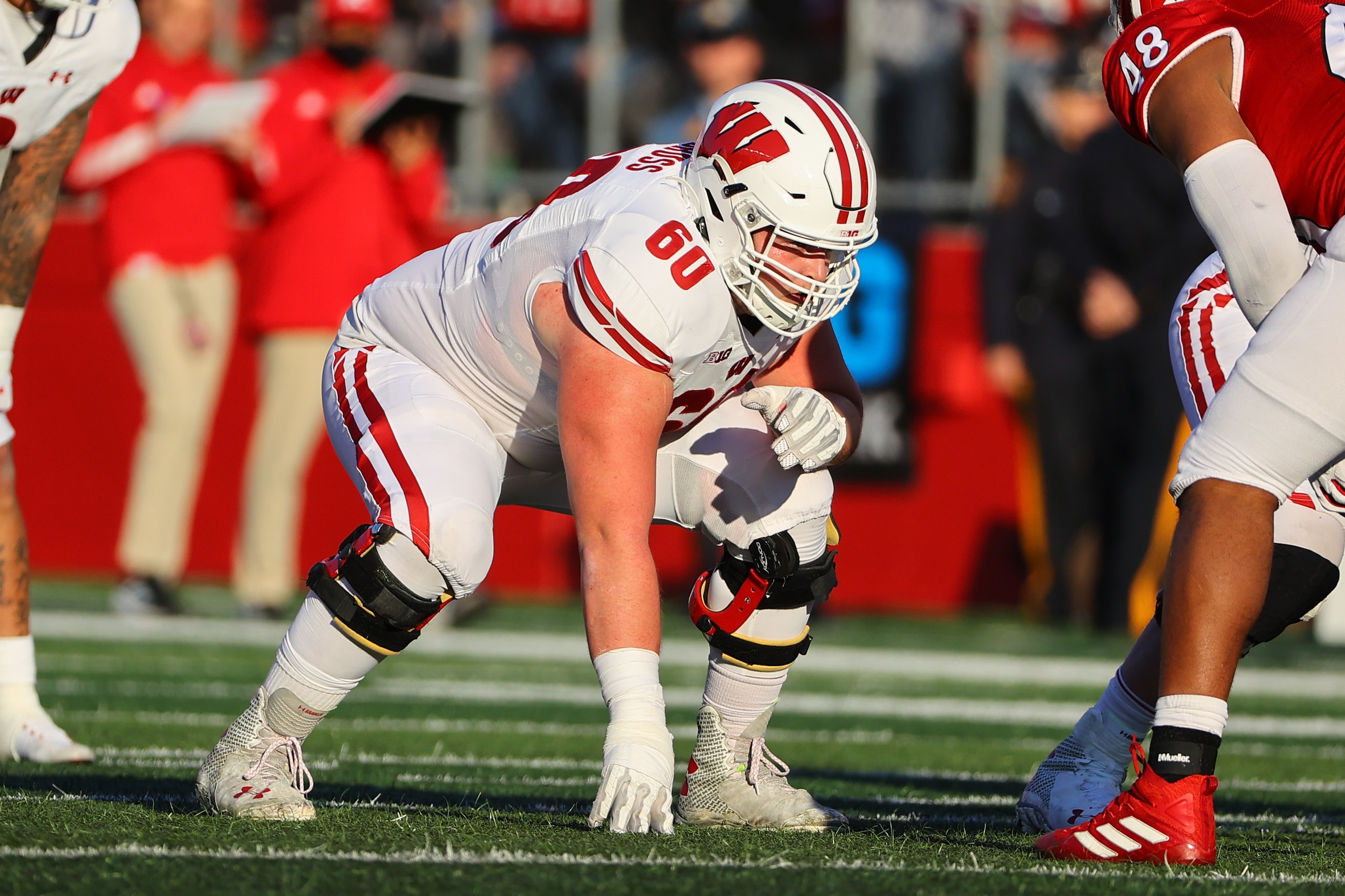 PISCATAWAY, NJ - NOVEMBER 06:  Wisconsin Badgers offensive lineman Logan Bruss (60) during the college football game between the Rutgers Scarlet Knights and the Wisconsin Badgers on November 6, 2021 at SHI Stadium in Piscataway, NJ.  (Photo by Rich Graessle/Icon Sportswire via Getty Images)