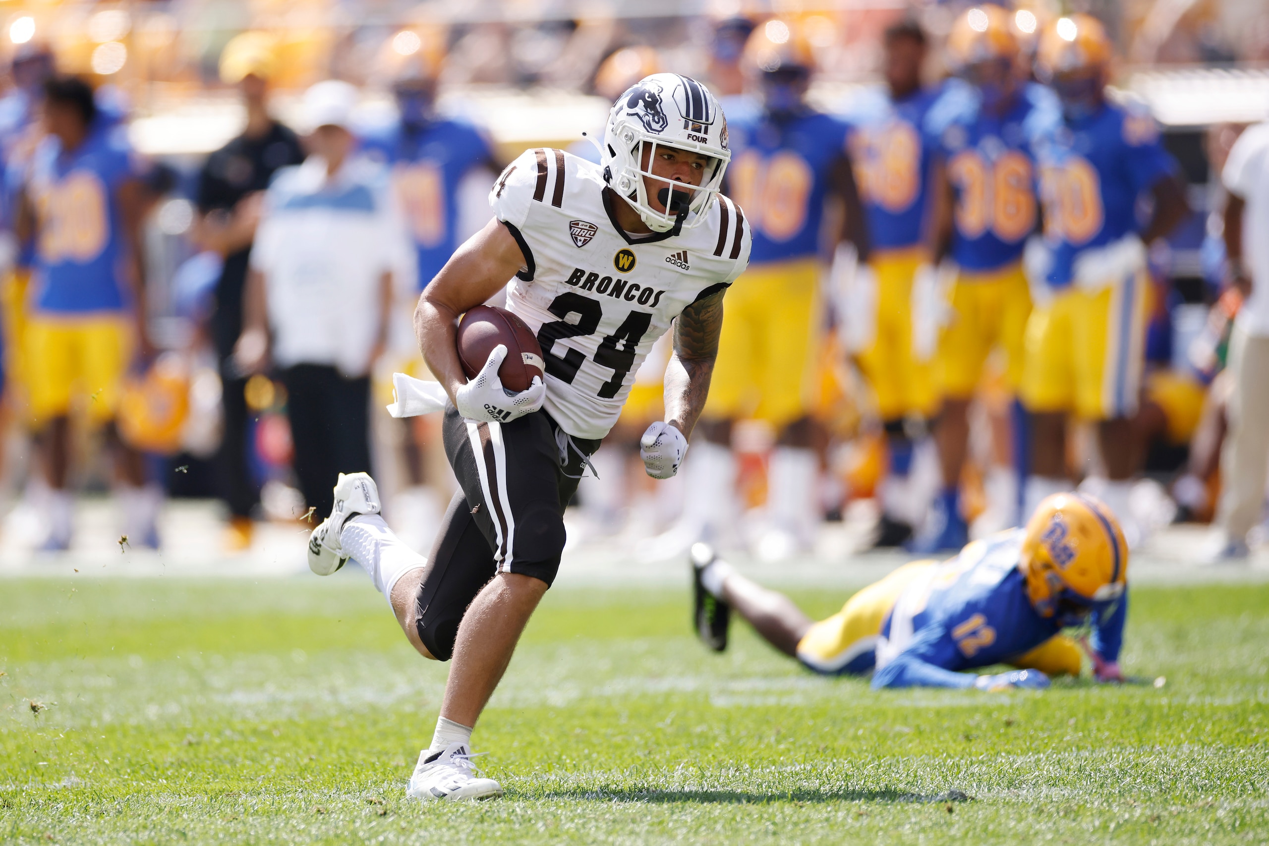 PITTSBURGH, PA - SEPTEMBER 18: Western Michigan Broncos wide receiver Skyy Moore (24) runs the ball into the end zone for a 30-yard touchdown after a reception against the Pittsburgh Panthers during a college football game on Sept. 18, 2021 at Heinz Field in Pittsburgh, Pennsylvania. (Photo by Joe Robbins/Icon Sportswire via Getty Images) PITTSBURGH, PA - SEPTEMBER 18: Western Michigan Broncos wide receiver Skyy Moore (24) runs the ball into the end zone for a 30-yard touchdown after a reception against the Pittsburgh Panthers during a college football game on Sept. 18, 2021 at Heinz Field in Pittsburgh, Pennsylvania. (Photo by Joe Robbins/Icon Sportswire via Getty Images)