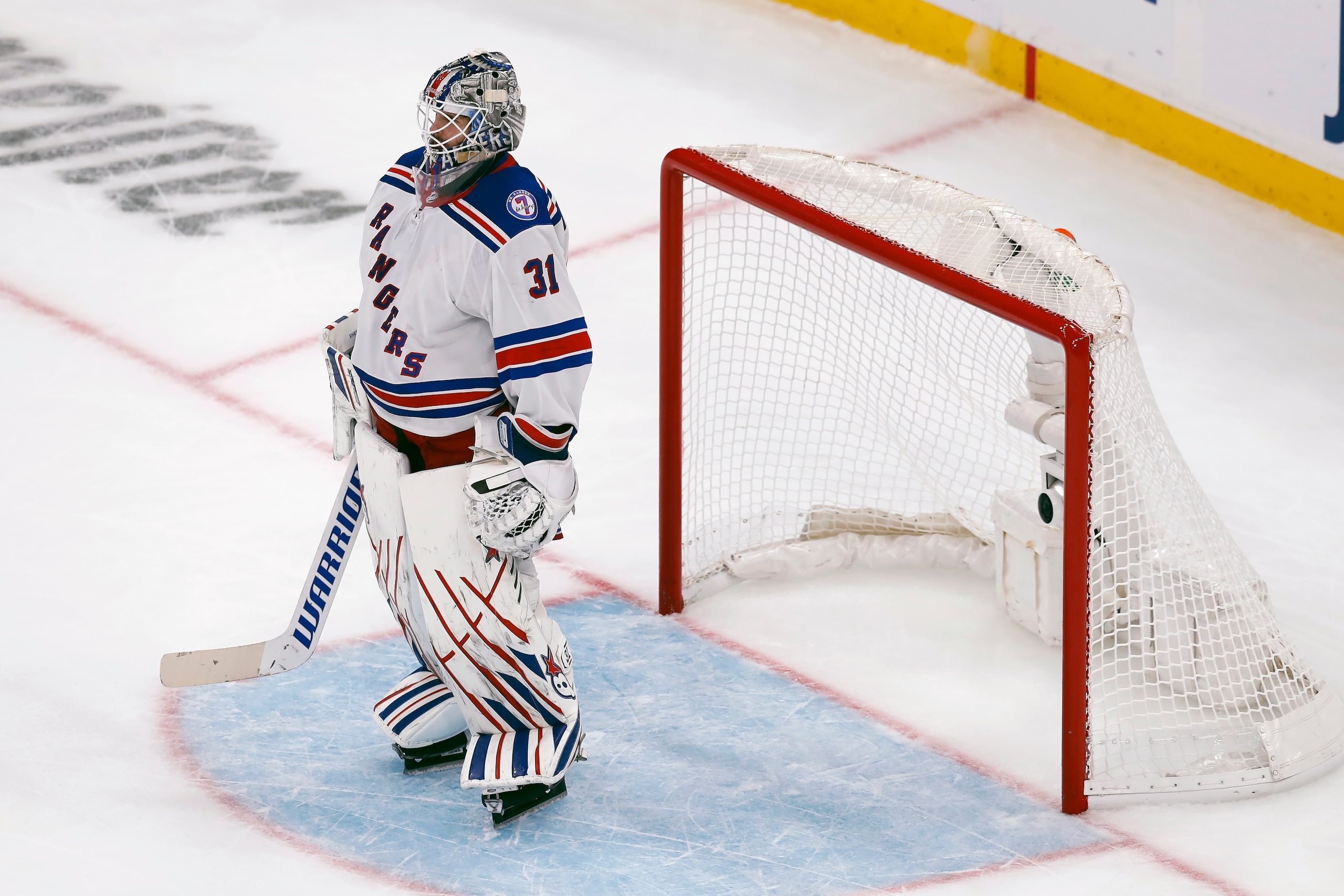 New York Rangers' Igor Shesterkin stands in front of the gaol as time runs out during the third period of an NHL hockey game against the Boston Bruins, Saturday, April 23, 2022, in Boston. (AP Photo/Michael Dwyer)