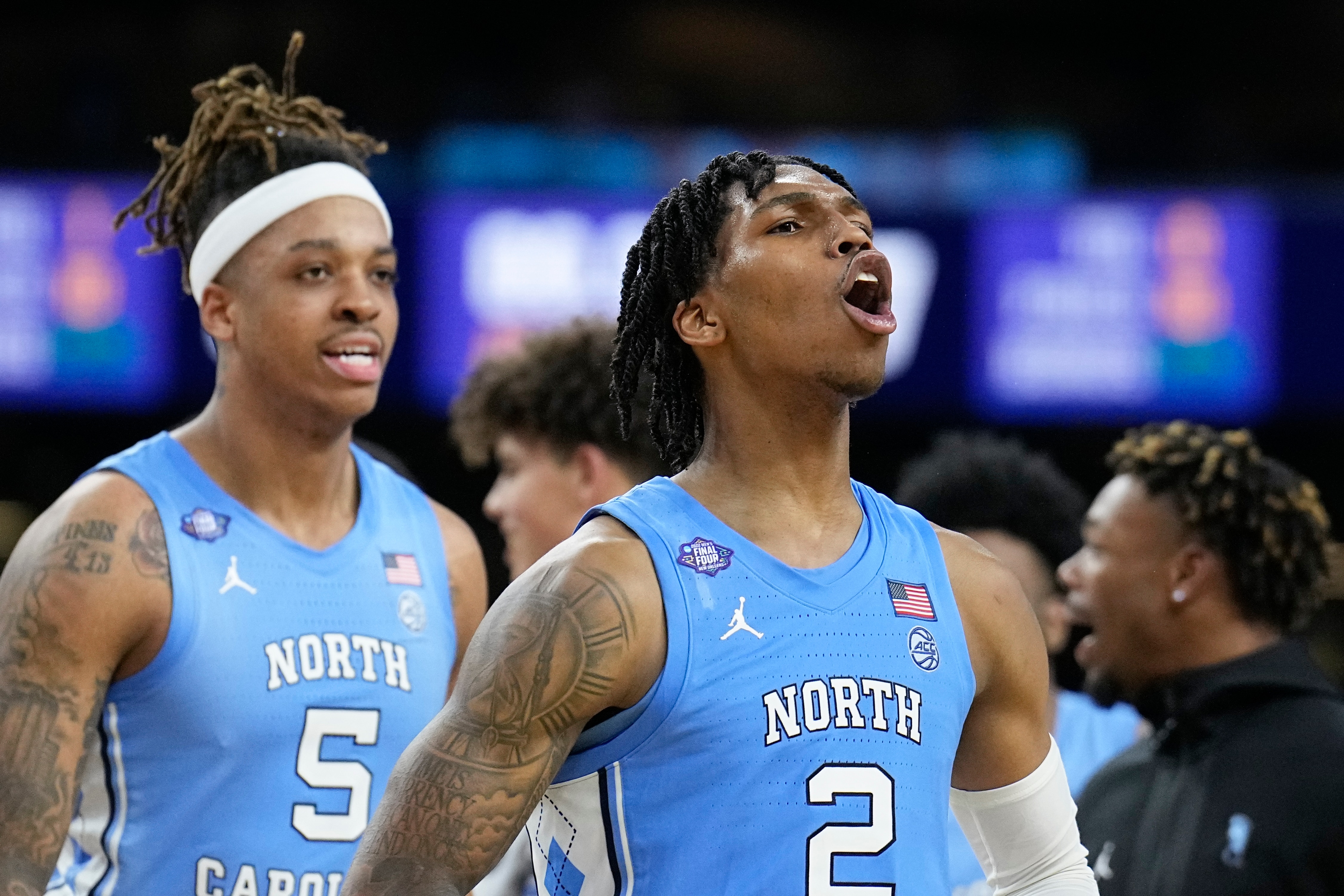 North Carolina's Caleb Love (2) celebrates after North Carolina's win against Duke in a college basketball game during the semifinal round of the Men's Final Four NCAA tournament, Saturday, April 2, 2022, in New Orleans.(AP Photo/Brynn Anderson)