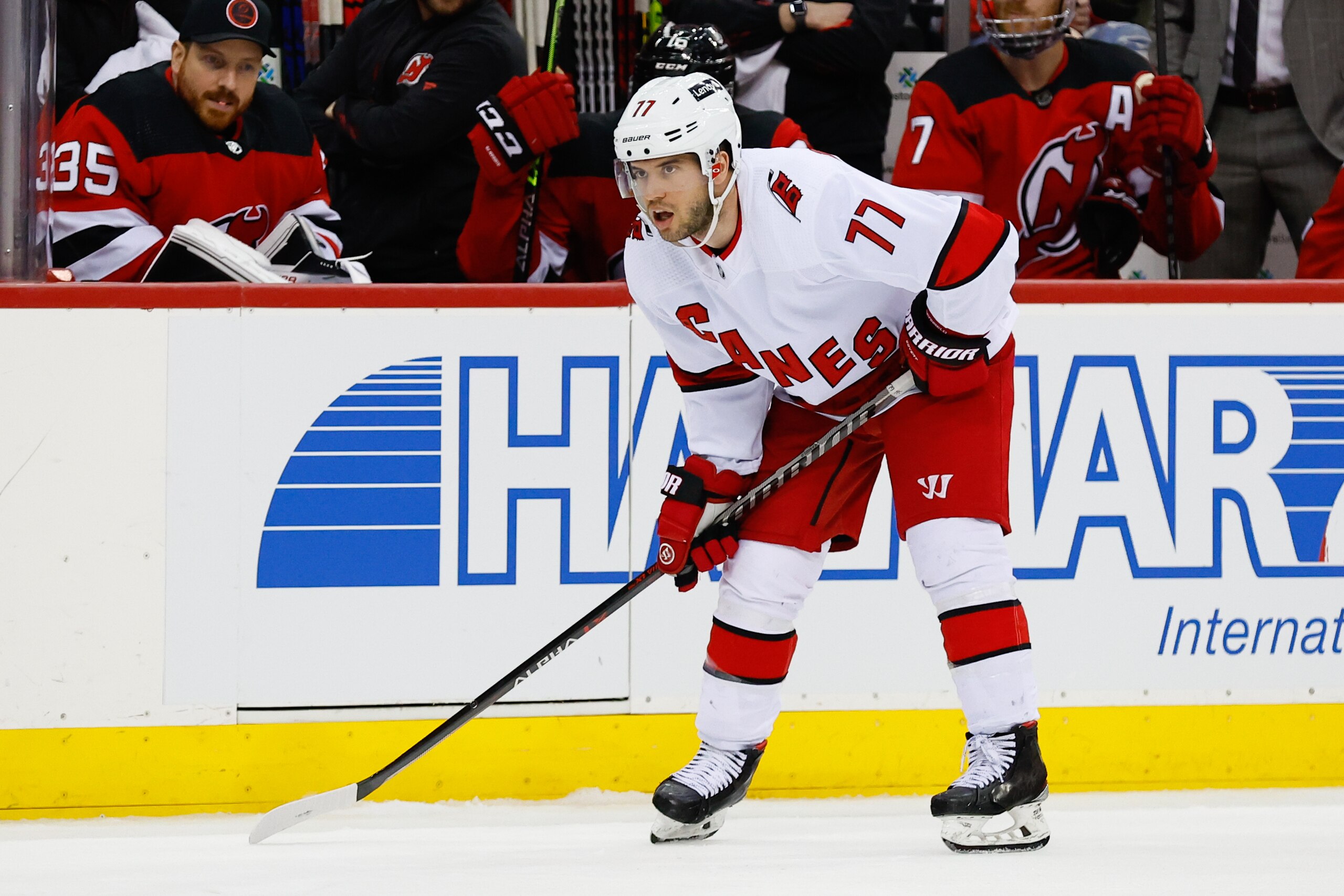 NEWARK, NJ - APRIL 23:  Carolina Hurricanes defenseman Tony DeAngelo (77) skates during the National Hockey League game between the New Jersey Devils and the Carolina Hurricanes on April 23, 2022 at the Prudential Center Center in Newark, New Jersey.  (Photo by Rich Graessle/Icon Sportswire via Getty Images)