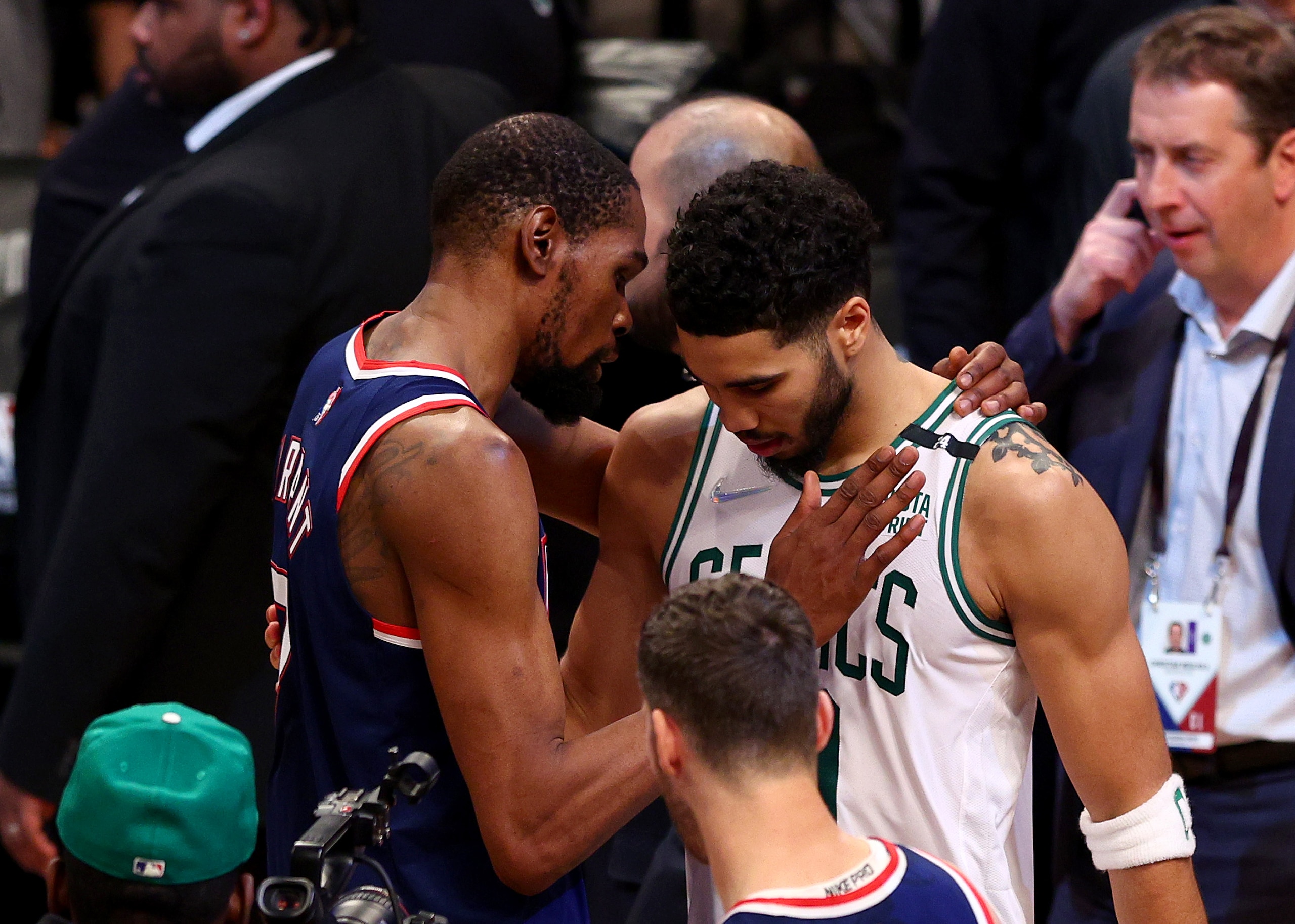 NEW YORK, NEW YORK - APRIL 25: Kevin Durant #7 of the Brooklyn Nets congratulates Jayson Tatum #0 of the Boston Celtics after Game Four of the Eastern Conference First Round Playoffs against the Boston Celtics at Barclays Center on April 25, 2022 in the Brooklyn borough of New York City. The Boston Celtics defeated the Brooklyn Nets 116-112. NOTE TO USER: User expressly acknowledges and agrees that, by downloading and or using this photograph, User is consenting to the terms and conditions of the Getty Images License Agreement. (Photo by Elsa/Getty Images)