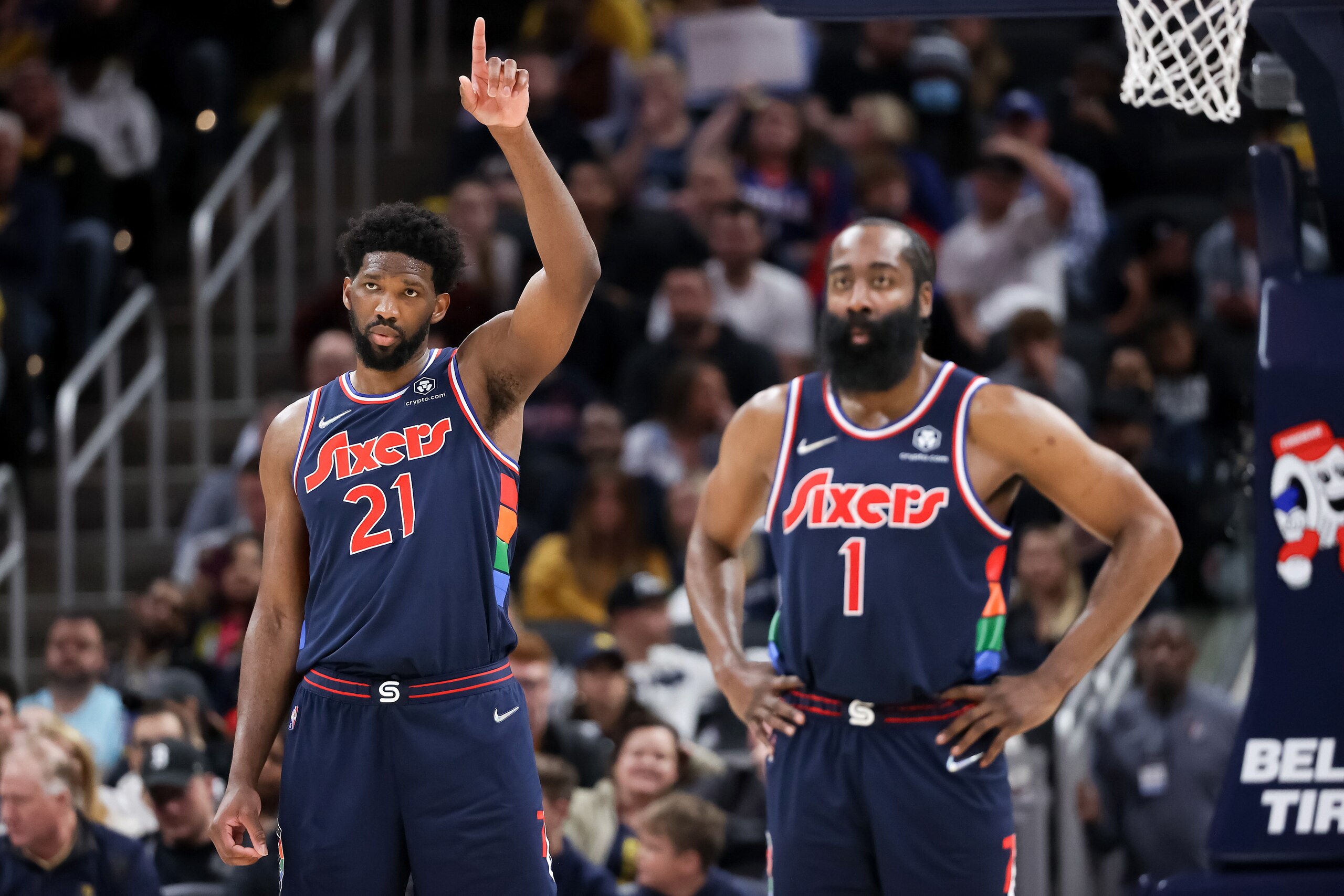 INDIANAPOLIS, INDIANA - APRIL 05: Joel Embiid #21 and James Harden #1 of the Philadelphia 76ers look on in the fourth quarter against the Indiana Pacers at Gainbridge Fieldhouse on April 05, 2022 in Indianapolis, Indiana. NOTE TO USER: User expressly acknowledges and agrees that, by downloading and or using this Photograph, user is consenting to the terms and conditions of the Getty Images License Agreement. (Photo by Dylan Buell/Getty Images)