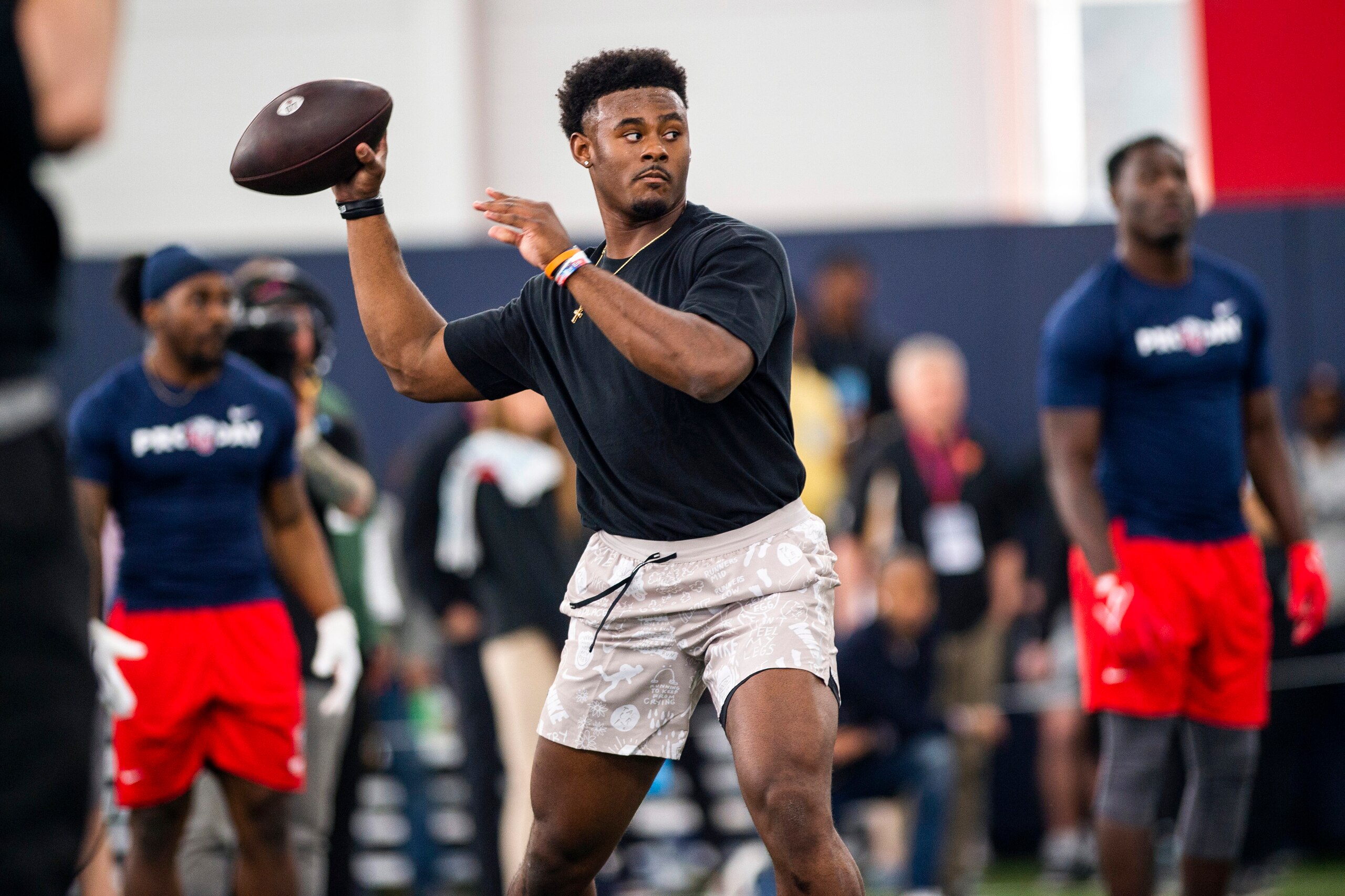 Liberty quarterback Malik Willis throws during the school's pro football day for NFL scouts and coaches, Tuesday, March 22, 2022, in Lynchburg, Va. (AP Photo/Kendall Warner)