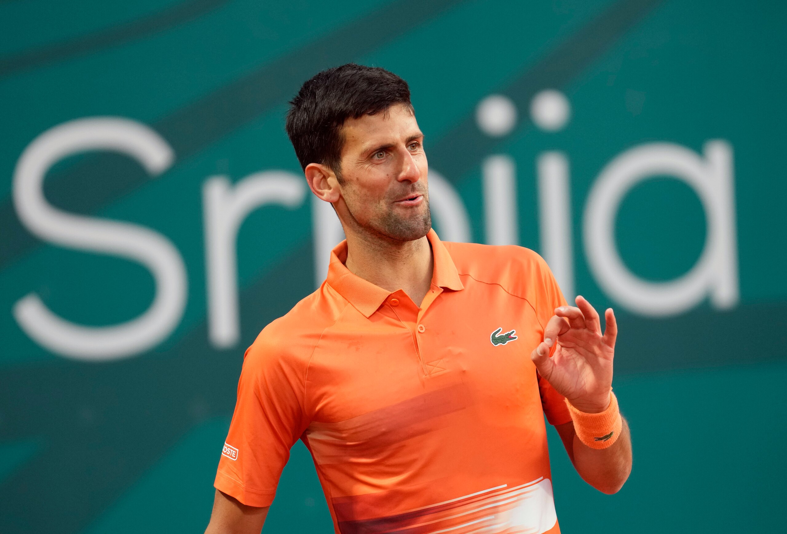 Novak Djokovic of Serbia reacts during their tennis match of the Serbia Open tennis tournament against Laslo Djere of Serbia in Belgrade, Serbia, Wednesday, April 20, 2022. (AP Photo/Darko Vojinovic)