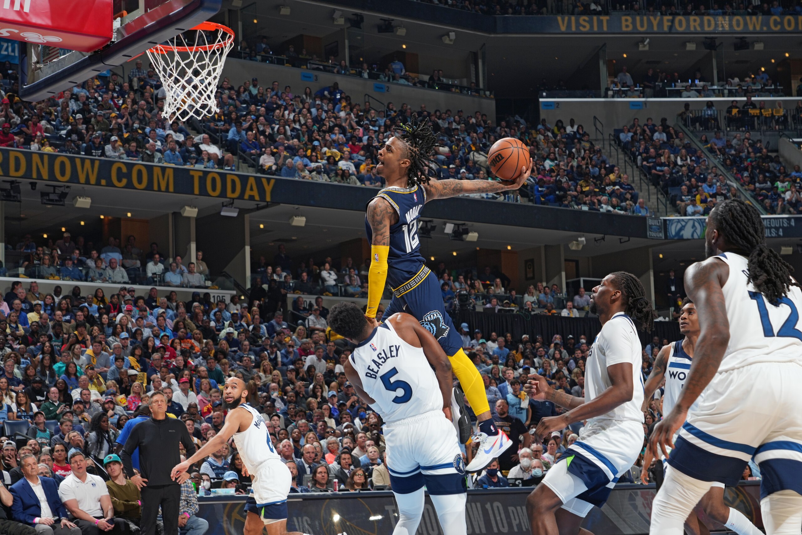 MEMPHIS, TN - APRIL 26: Ja Morant #12 of the Memphis Grizzlies dunks the ball against the Minnesota Timberwolves during Round 1 Game 5 on April 26, 2022 at FedExForum in Memphis, Tennessee. NOTE TO USER: User expressly acknowledges and agrees that, by downloading and/or using this Photograph, user is consenting to the terms and conditions of the Getty Images License Agreement. Mandatory Copyright Notice: Copyright 2022 NBAE (Photo by Jesse D. Garrabrant/NBAE via Getty Images)