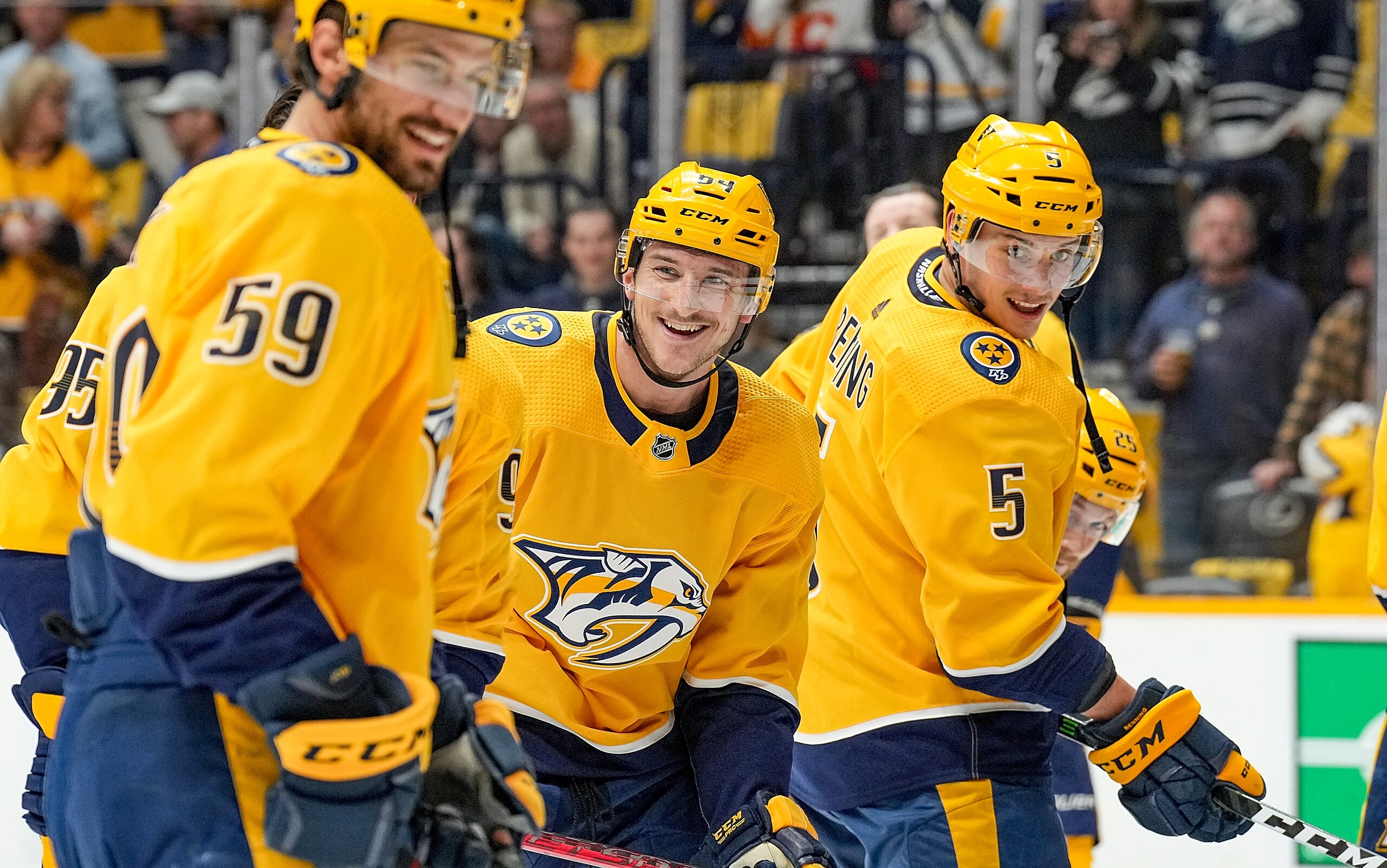 NASHVILLE, TN - APRIL 26: Tanner Jeannot #84 of the Nashville Predators smiles during warmups prior to an NHL game against the Calgary Flames at Bridgestone Arena on April 26, 2022 in Nashville, Tennessee. (Photo by John Russell/NHLI via Getty Images)