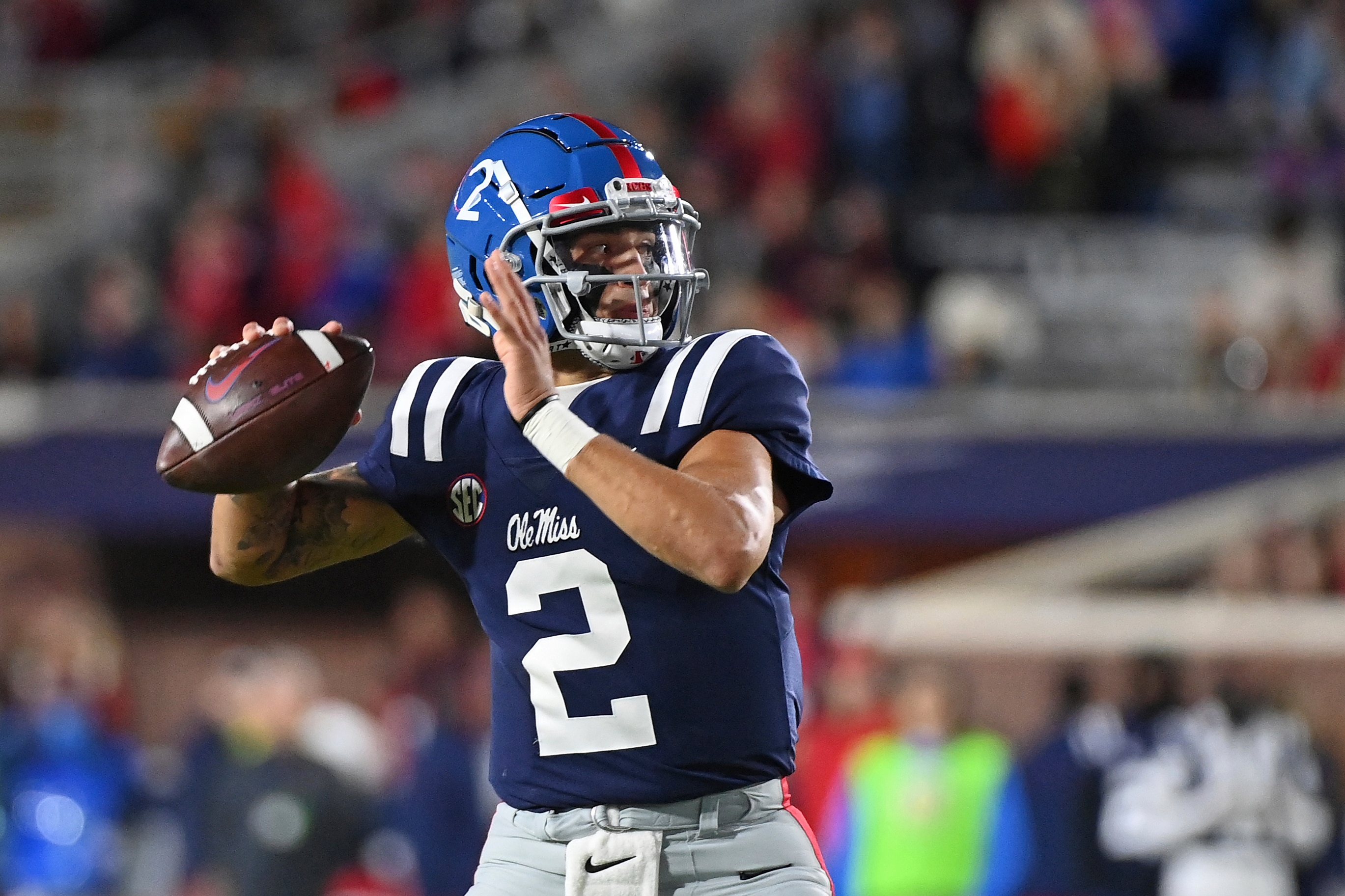 Mississippi quarterback Matt Corral (2) looks to pass during the first half of an NCAA college football game against Vanderbilt in Oxford, Miss., Saturday, Nov. 20, 2021. (AP Photo/Thomas Graning)