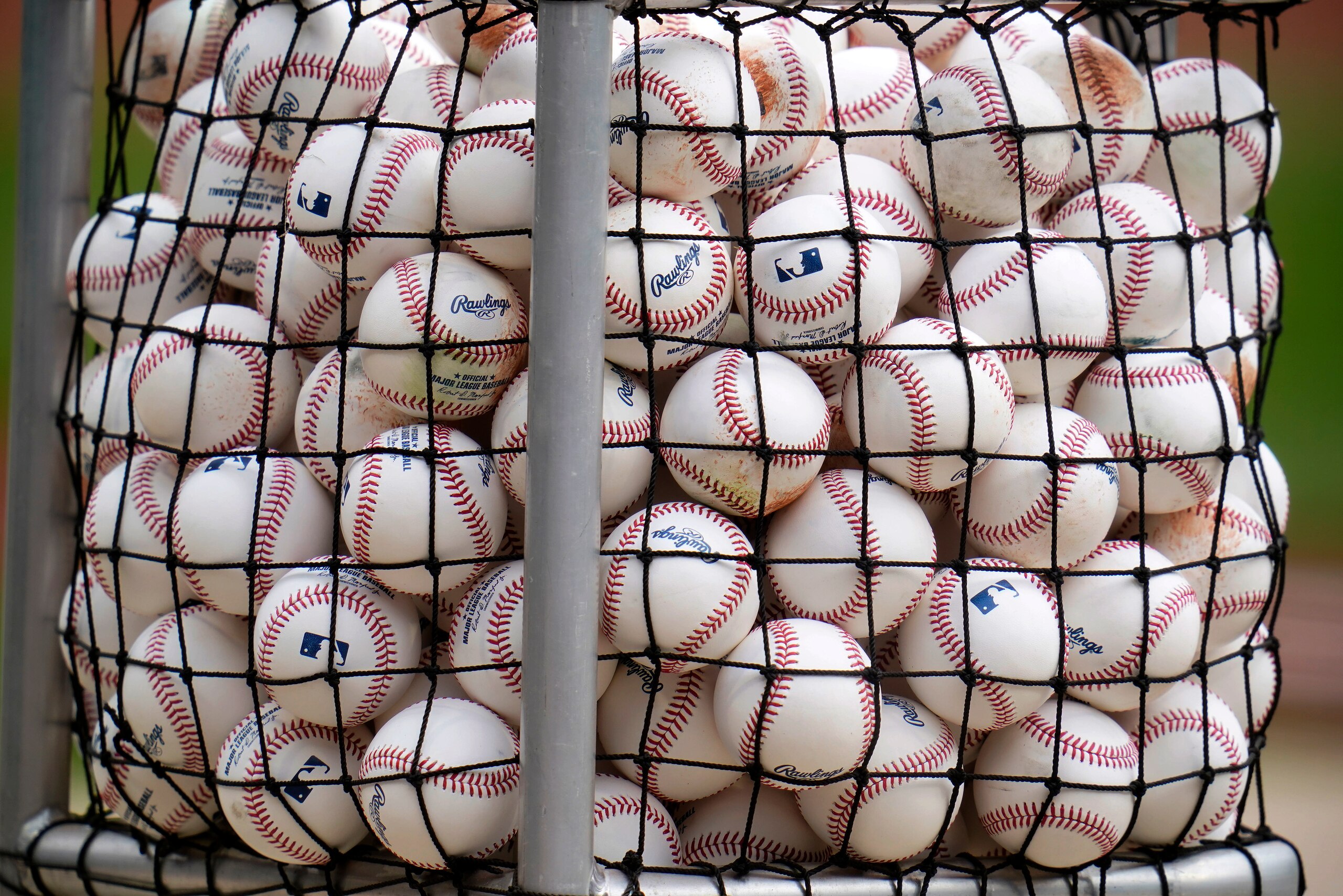 This is a basket of baseballs used during Pittsburgh Pirates batting practice before a baseball game against the Chicago Cubs in Pittsburgh, Tuesday, April 12, 2022. (AP Photo/Gene J. Puskar)