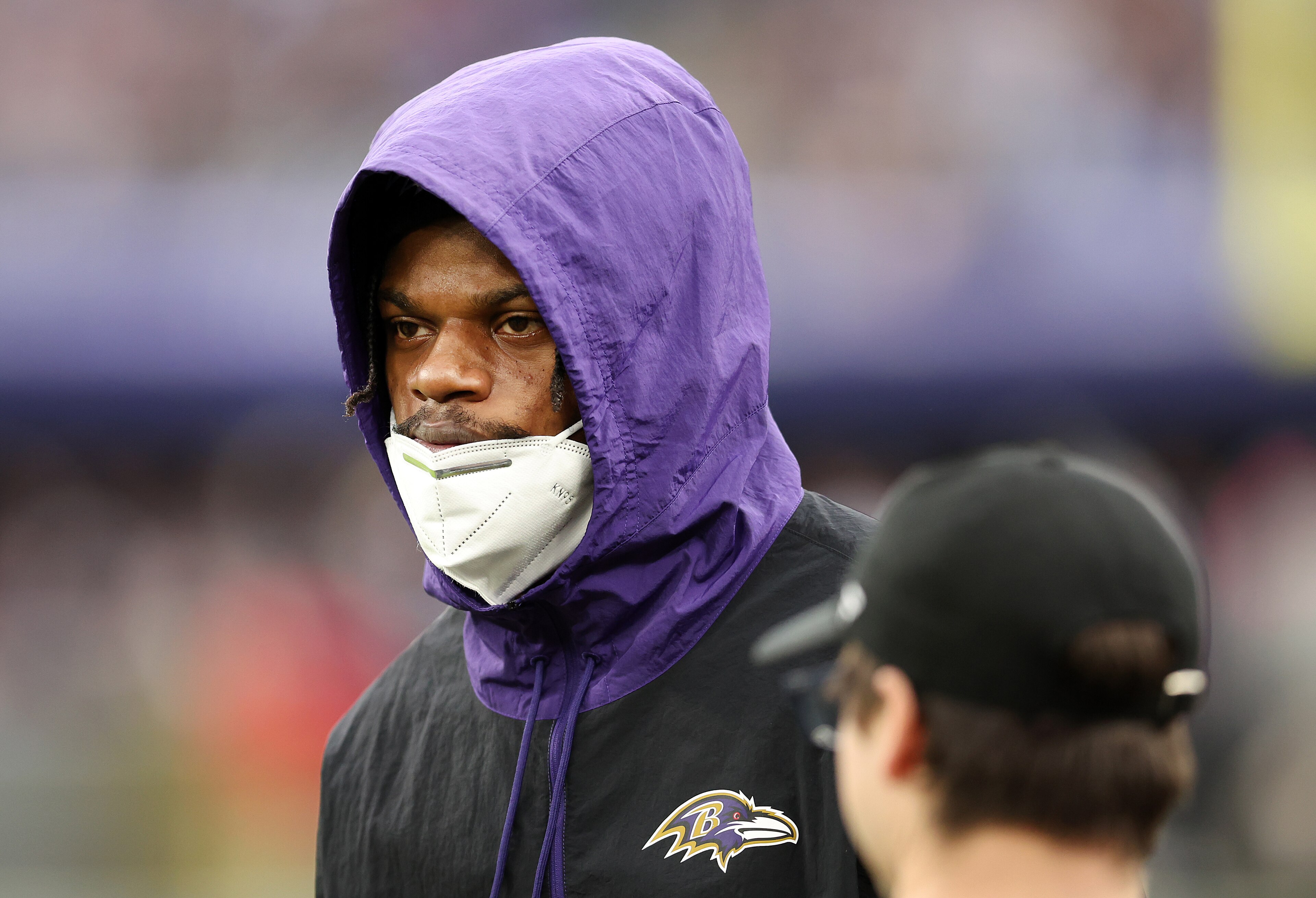 BALTIMORE, MARYLAND - JANUARY 02: Lamar Jackson #8 of the Baltimore Ravens looks on from the sidelines in the third quarter of the game against the Los Angeles Rams at M&T Bank Stadium on January 02, 2022 in Baltimore, Maryland. (Photo by Patrick Smith/Getty Images) BALTIMORE, MARYLAND - JANUARY 02: Lamar Jackson #8 of the Baltimore Ravens looks on from the sidelines in the third quarter of the game against the Los Angeles Rams at M&T Bank Stadium on January 02, 2022 in Baltimore, Maryland. (Photo by Patrick Smith/Getty Images)