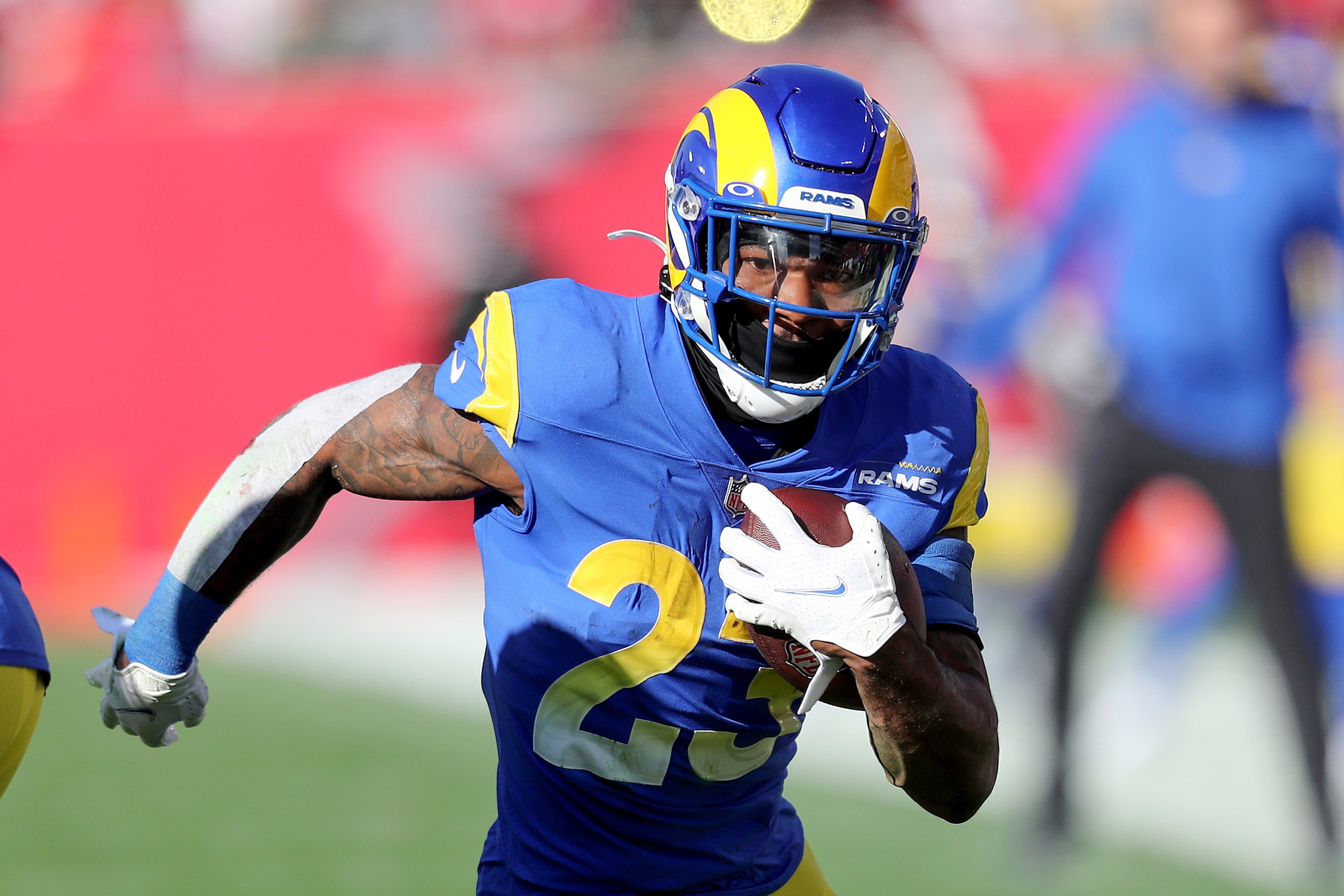 Los Angeles Rams running back Cam Akers (23) runs with the ball during a NFL divisional playoff football game between the Los Angeles Rams and Tampa Bay Buccaneers, Sunday, January 23, 2022 in Tampa, Fla. (AP Photo/Alex Menendez)