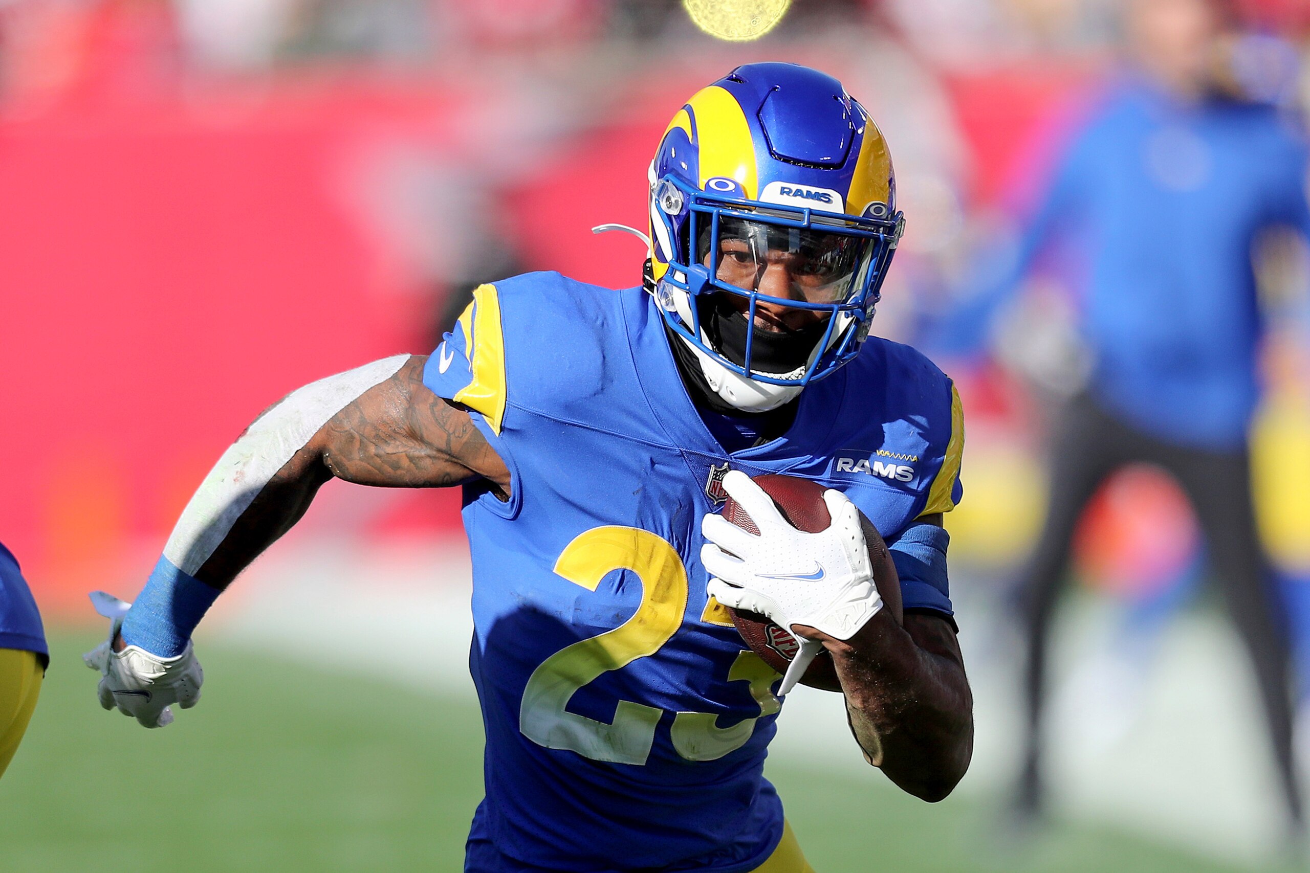 Los Angeles Rams running back Cam Akers (23) runs with the ball during a NFL divisional playoff football game between the Los Angeles Rams and Tampa Bay Buccaneers, Sunday, January 23, 2022 in Tampa, Fla. (AP Photo/Alex Menendez)