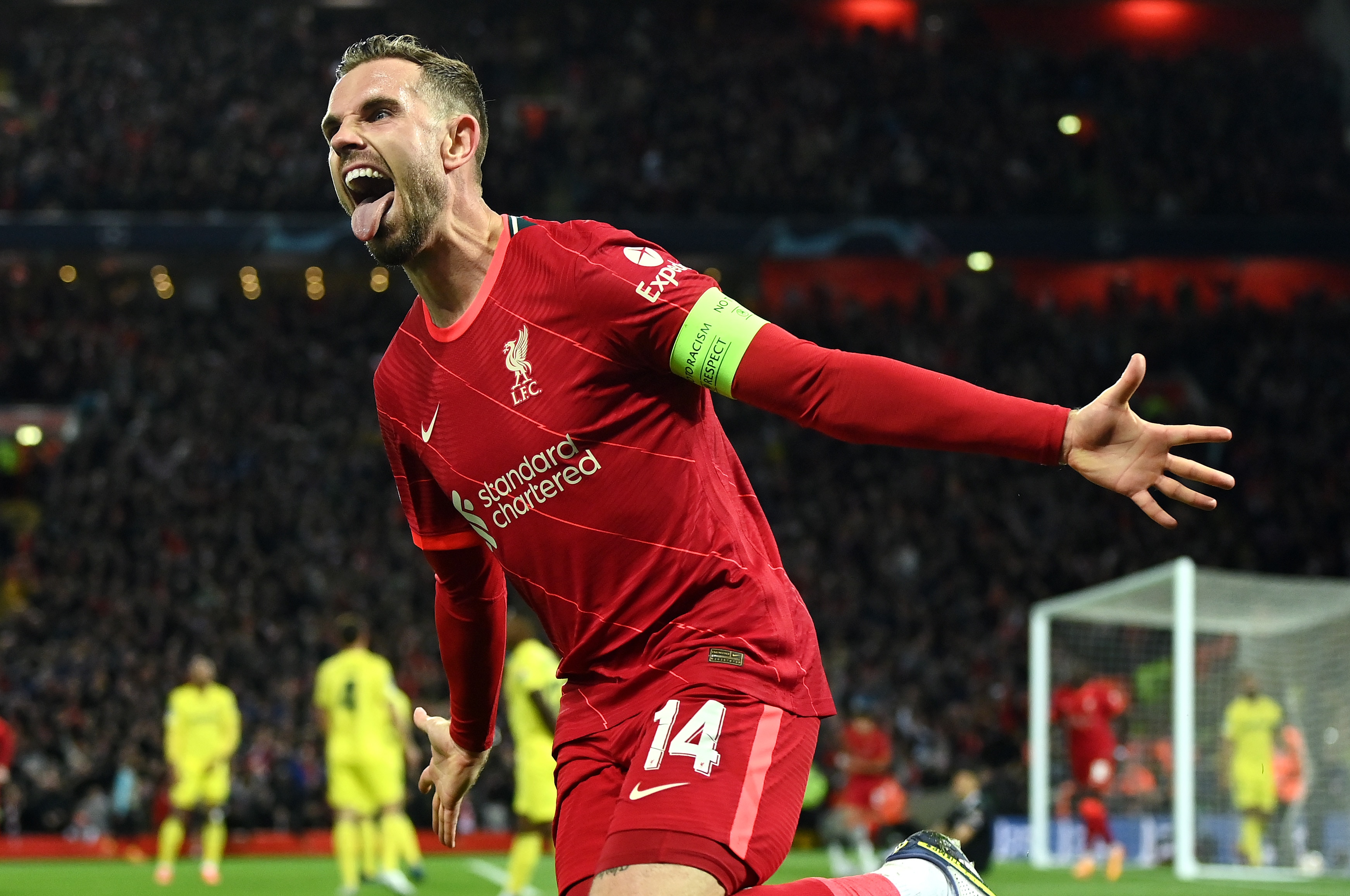 LIVERPOOL, ENGLAND - APRIL 27: Jordan Henderson of Liverpool celebrates after their team's first goal which came through a Geronimo Rulli of Villarreal CF (not pictured) own goal during the UEFA Champions League Semi Final Leg One match between Liverpool and Villarreal at Anfield on April 27, 2022 in Liverpool, England. (Photo by David Ramos/Getty Images)