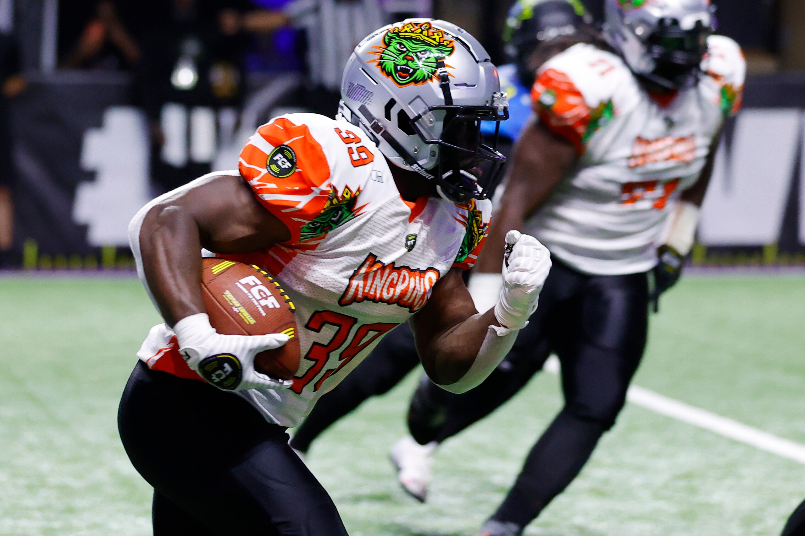 ATLANTA, GEORGIA - APRIL 16: Daryl Virgies #39 of the Kingpins carries the ball against 8OKI in the second half of the Fan Controlled Football League game on April 16, 2022 in Atlanta, Georgia. (Photo by Todd Kirkland/Fan Controlled Football/Getty Images)