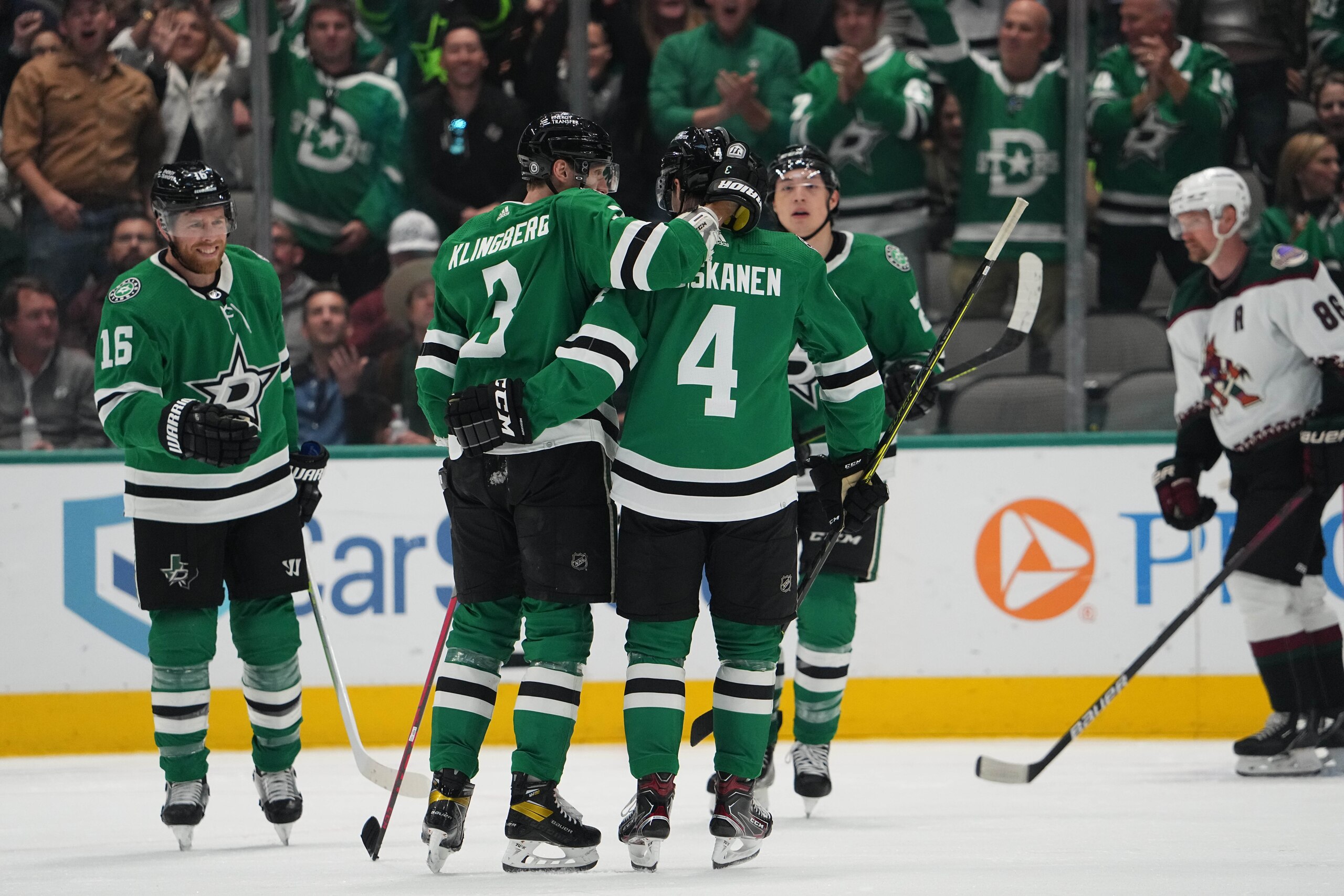 DALLAS, TX - APRIL 27: Joe Pavelski #16, John Klingberg #3, Miro Heiskanen #4 and the Dallas Stars celebrate a goal against the Arizona Coyotes at the American Airlines Center on April 27, 2022 in Dallas, Texas. (Photo by Glenn James/NHLI via Getty Images)