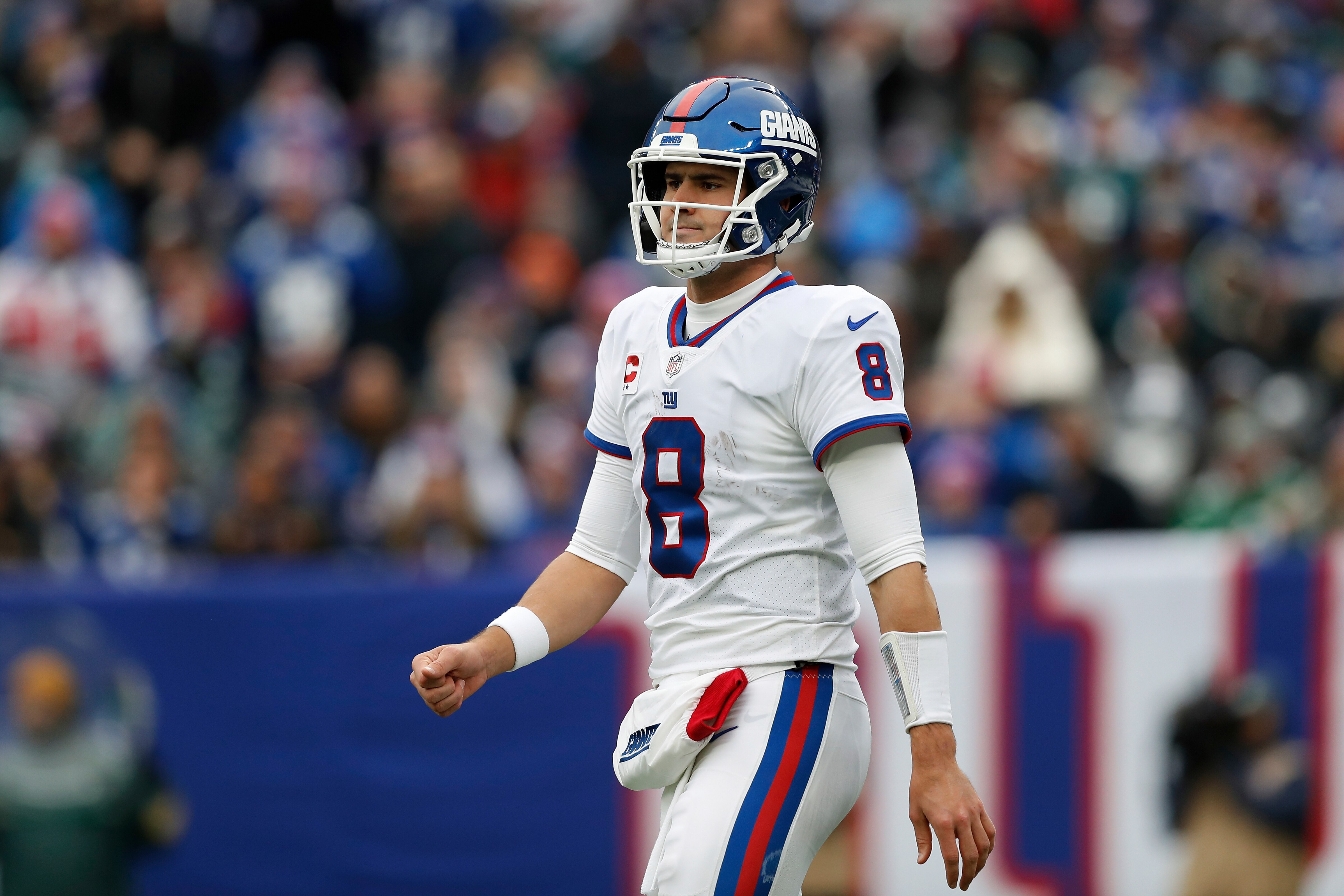 New York Giants quarterback Daniel Jones (8) walks on the field during an NFL football game against the Philadelphia Eagles, Sunday, Nov. 28, 2021, in East Rutherford, N.J. The New York Giants defeated the Philadelphia Eagles 13-7. (AP Photo/Steve Luciano) New York Giants quarterback Daniel Jones (8) walks on the field during an NFL football game against the Philadelphia Eagles, Sunday, Nov. 28, 2021, in East Rutherford, N.J. The New York Giants defeated the Philadelphia Eagles 13-7. (AP Photo/Steve Luciano)