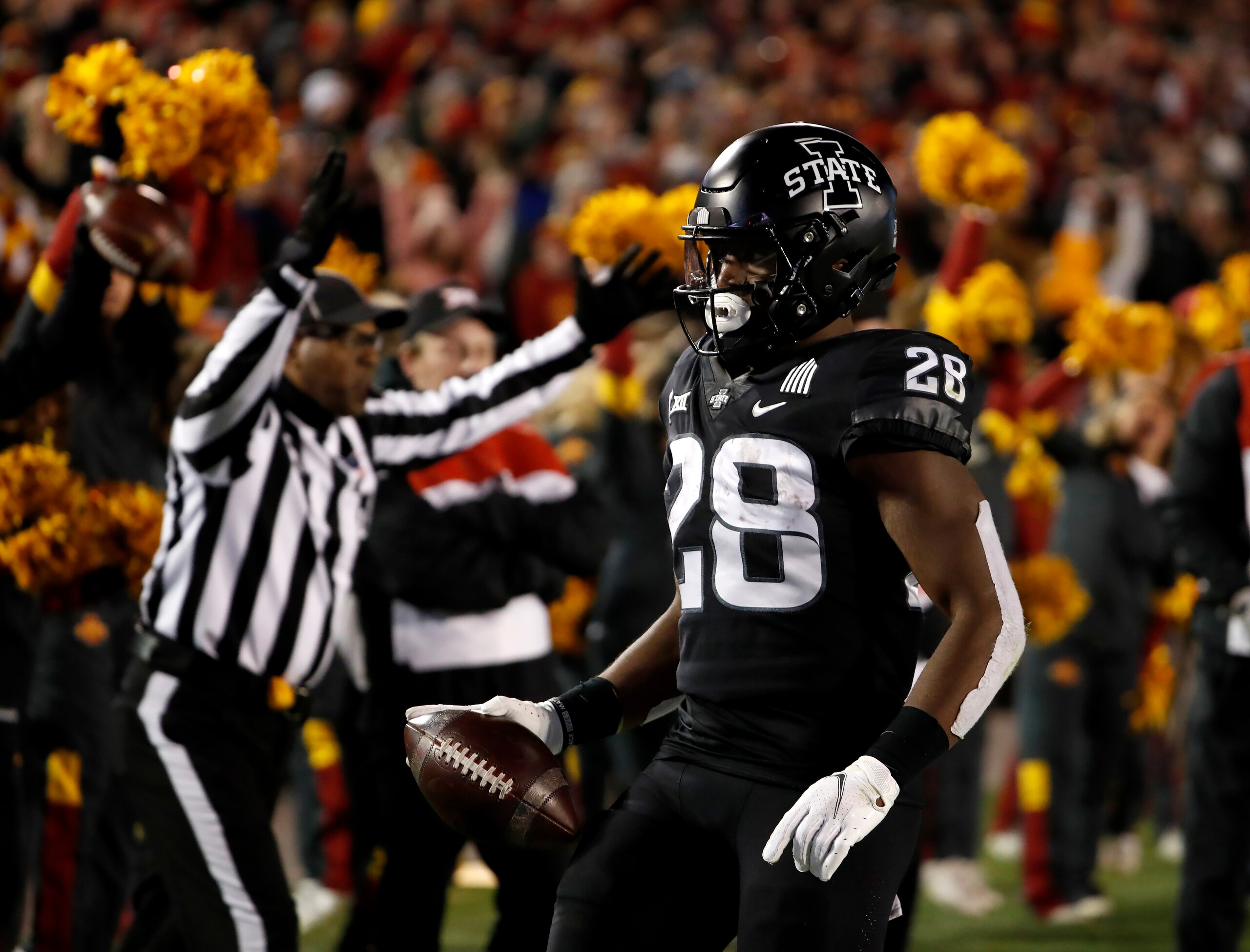 AMES, IA - NOVEMBER 26: Running back Breece Hall #28 of the Iowa State Cyclones scores a touchdown in the second half of play against the TCU Horned Frogs at Jack Trice Stadium on November 26, 2021 in Ames, Iowa. The Iowa State Cyclones won 48-14 over the TCU Horned Frogs. (Photo by David Purdy/Getty Images)