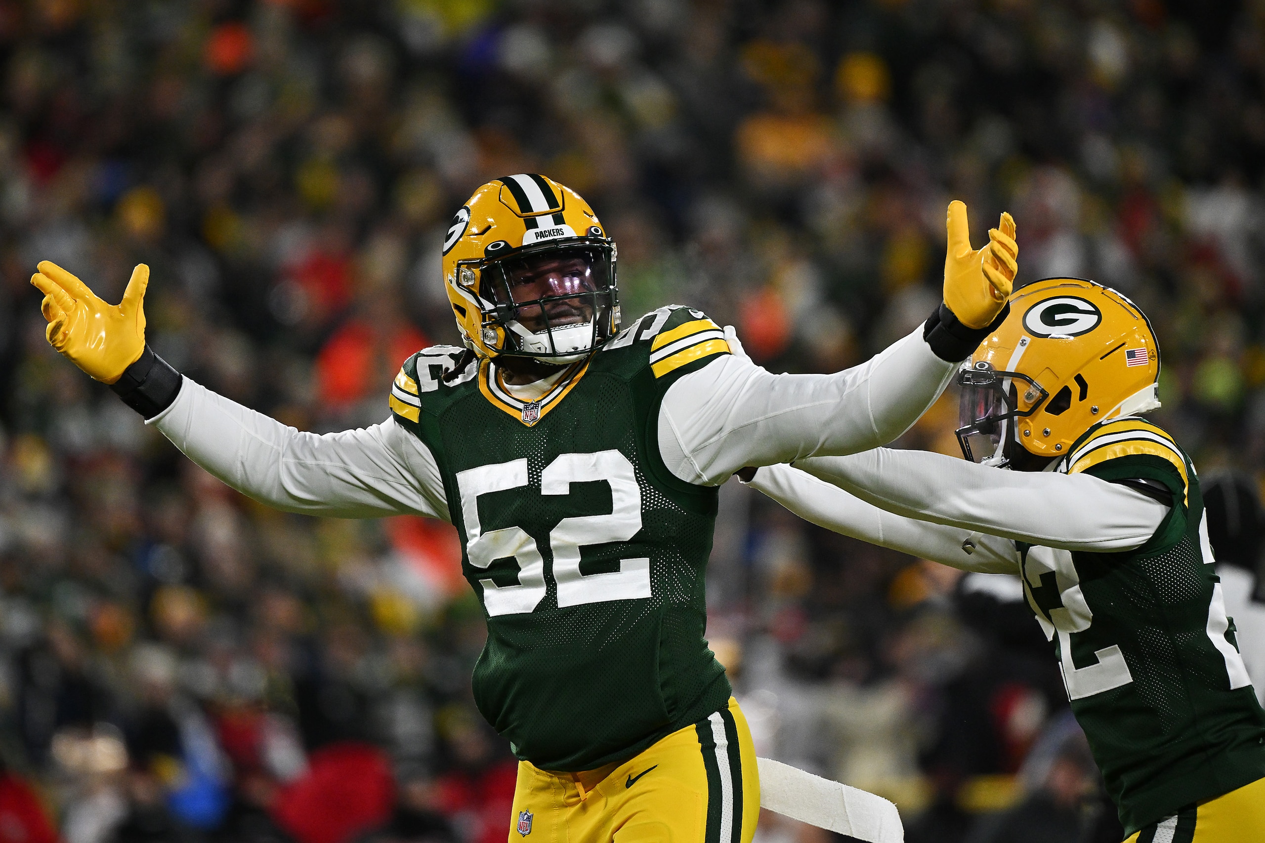GREEN BAY, WISCONSIN - JANUARY 22:  Rashan Gary #52 of the Green Bay Packers reacts after making a sack during the first half of the NFC Divisional Playoff game against the San Francisco 49ers at Lambeau Field on January 22, 2022 in Green Bay, Wisconsin. (Photo by Quinn Harris/Getty Images)
