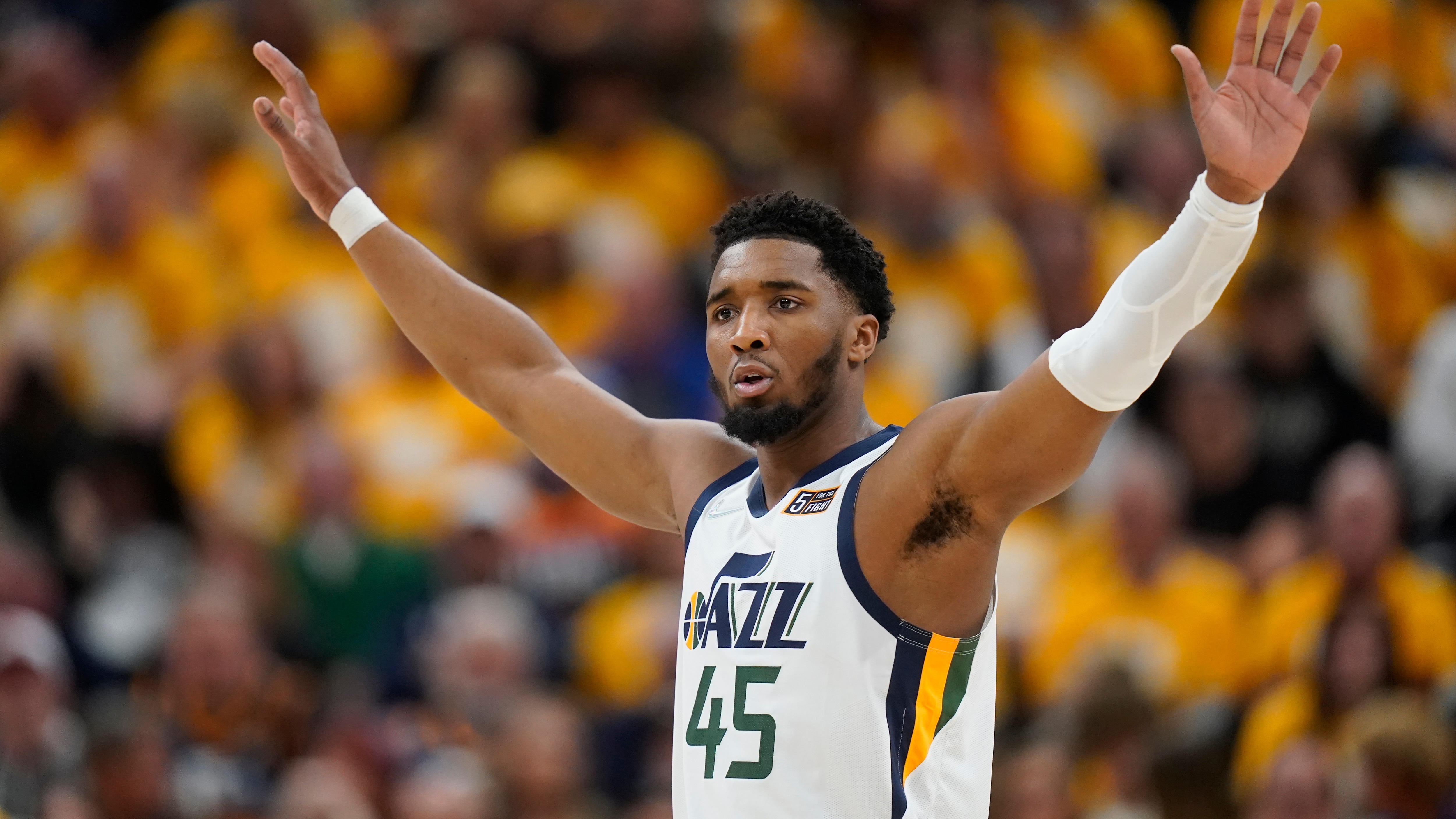Utah Jazz guard Donovan Mitchell (45) reacts in the second half of Game 4 of an NBA basketball first-round playoff series against the Dallas Mavericks Saturday, April 23, 2022, in Salt Lake City. (AP Photo/Rick Bowmer)